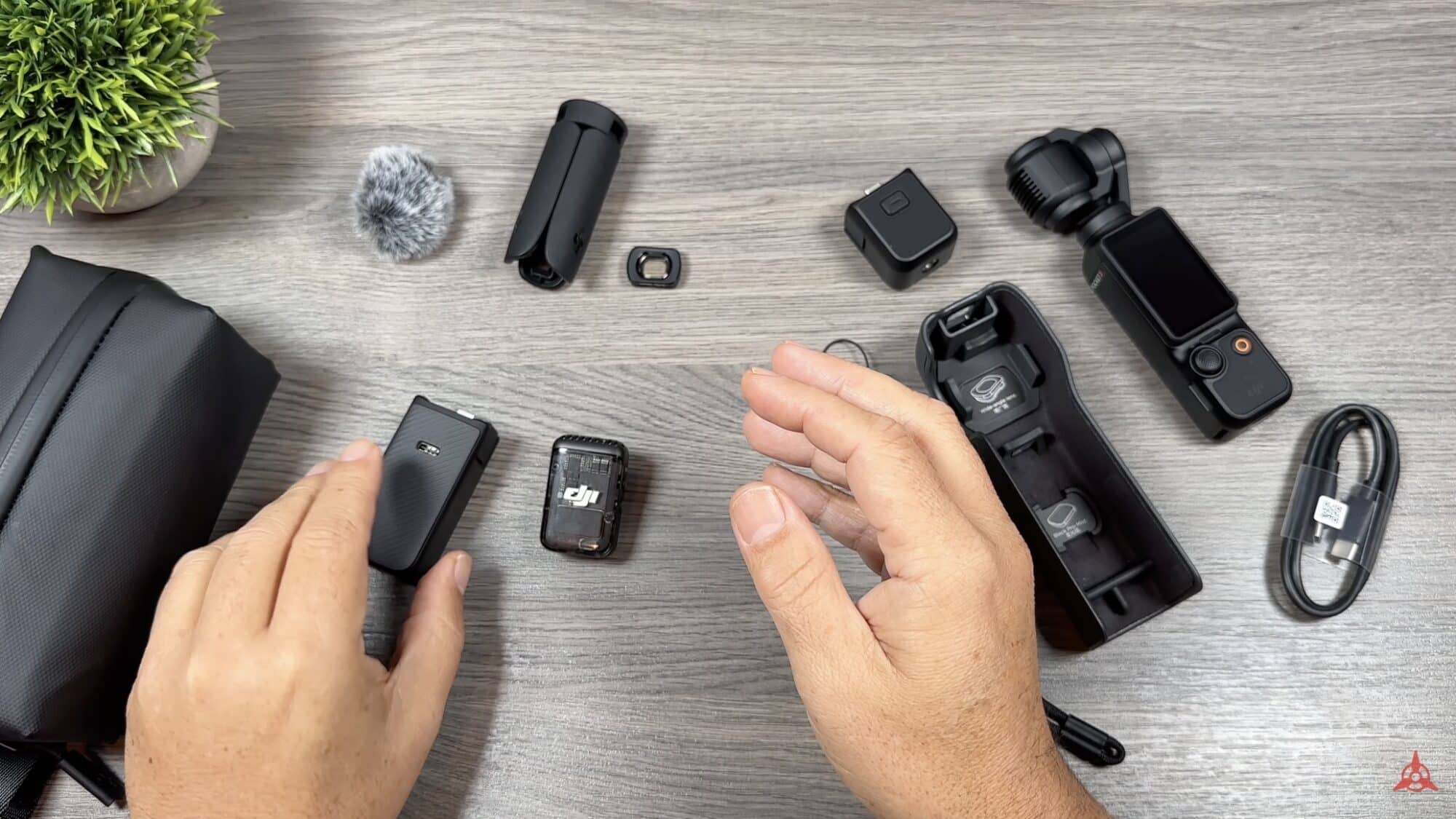 DJI Osmo Pocket 3 basic package and Creator Combo contents laid out on a desk.