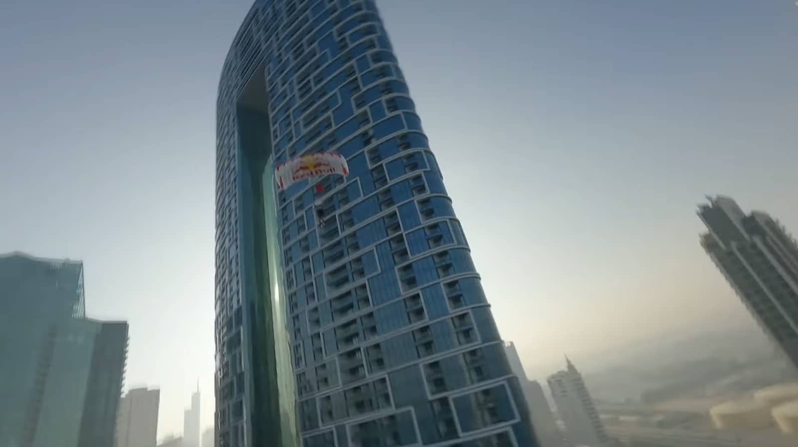 WakeBase stunt combining drone wakeskating and BASE jumping in Dubai.