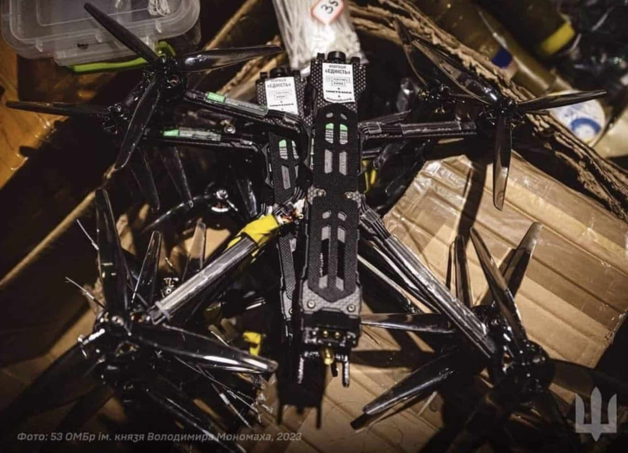 Ukrainian soldiers of the 53rd Mechanized Brigade preparing an explosive-laden FPV drone near Donetsk Oblast.