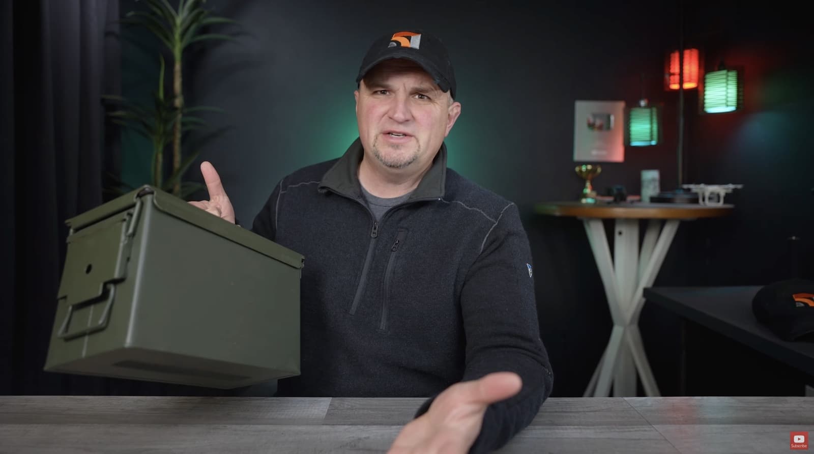 Metal ammunition box used to store DJI Air 3 drone batteries safely.