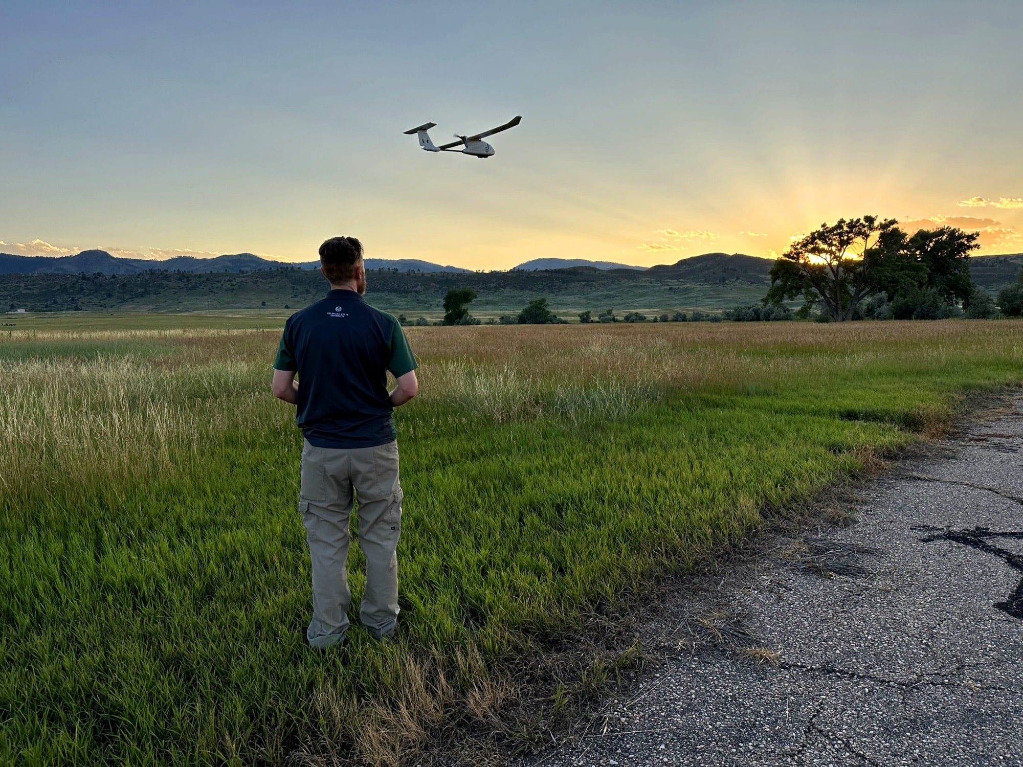 CSU Drone Center researchers flying a Wingtra drone for field research.