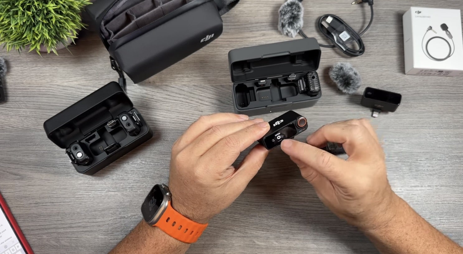 Shawn of Air Photography unboxing the DJI Mic 2 case, cables and windscreens.