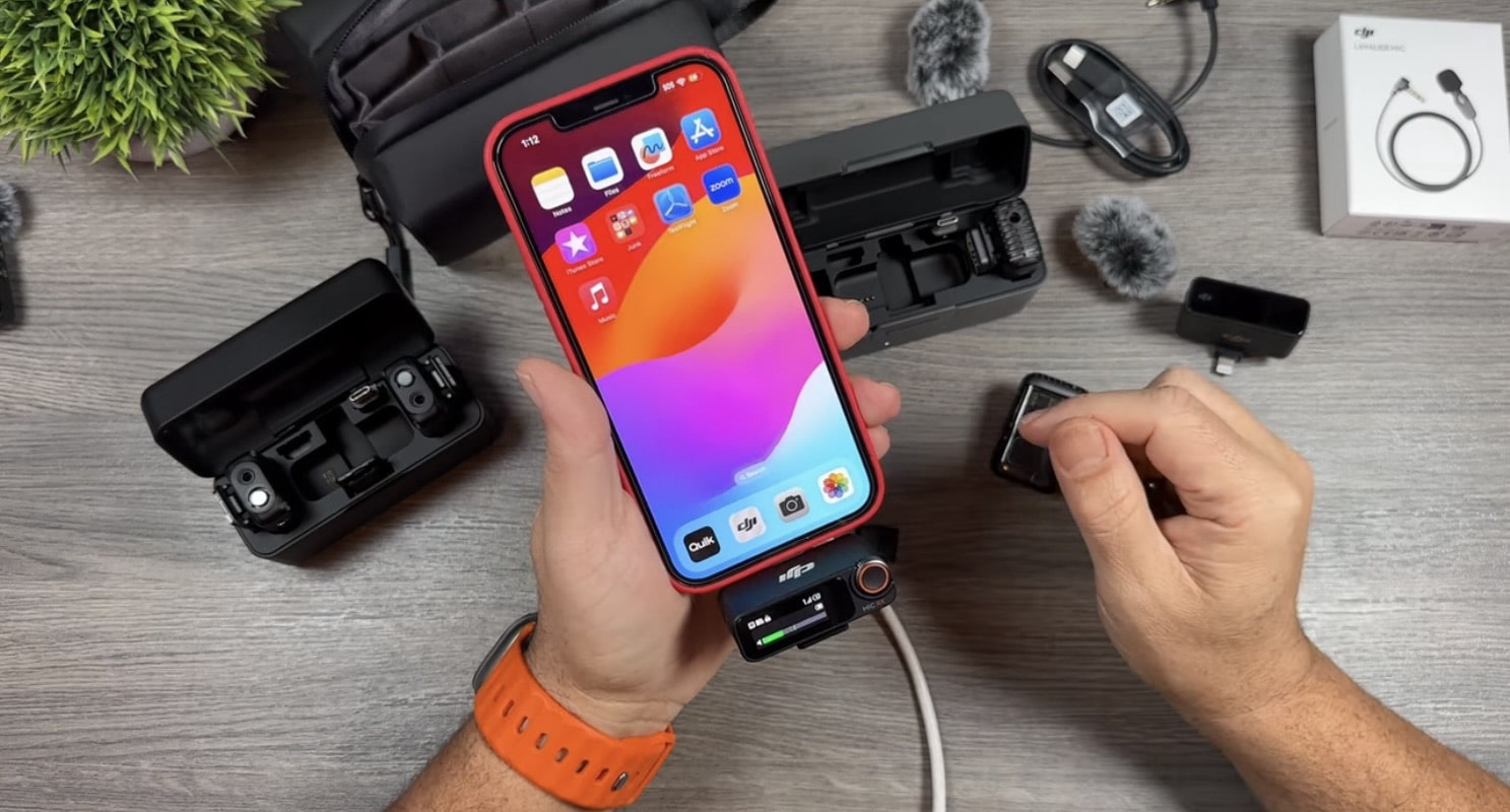 A DJI Mic 2 transmitter that pairs by Bluetooth with the DJI Osmo Action 4.