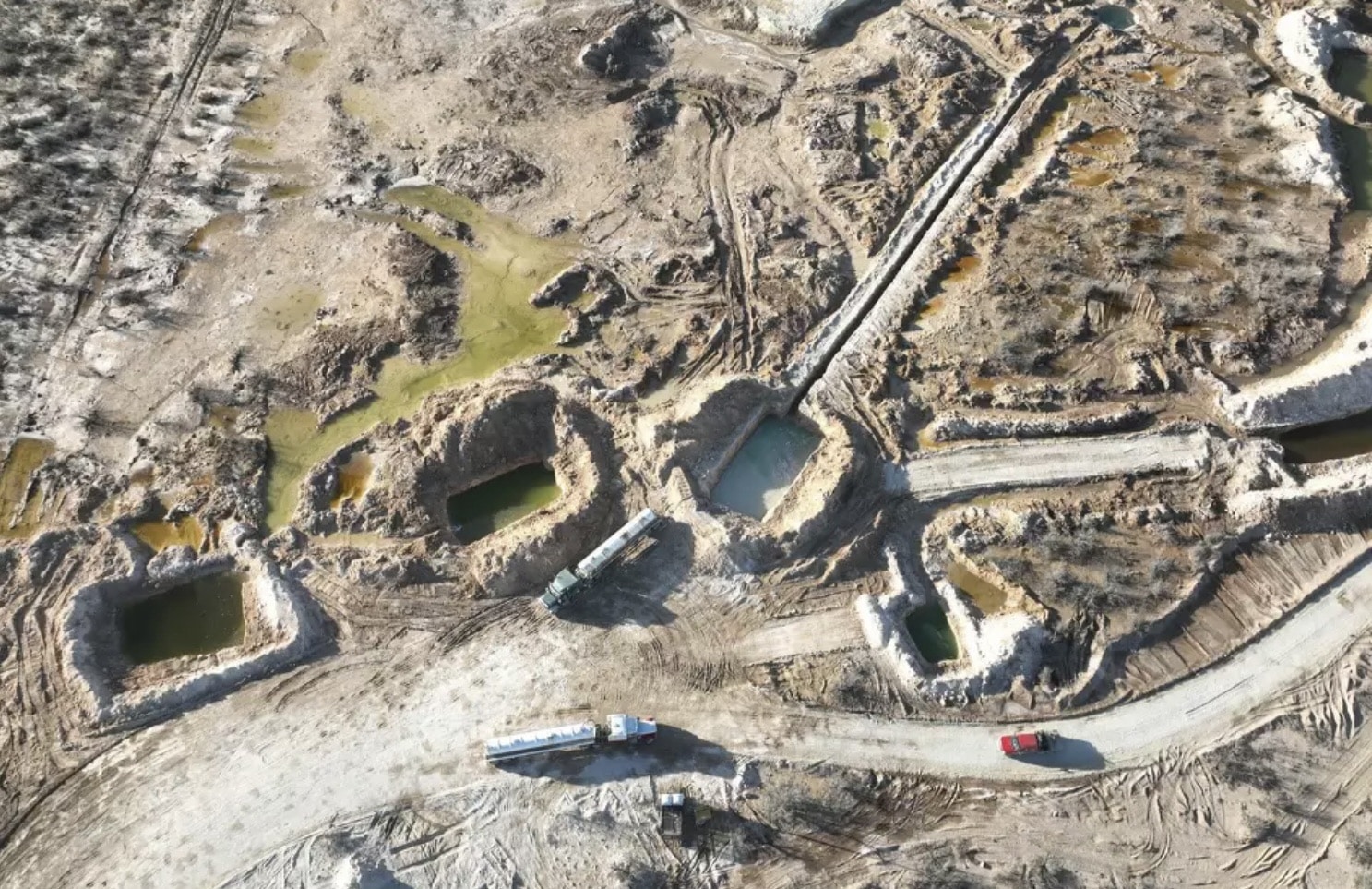 Drone photo by Sarah Stogner showing an abandoned oil well site in West Texas.