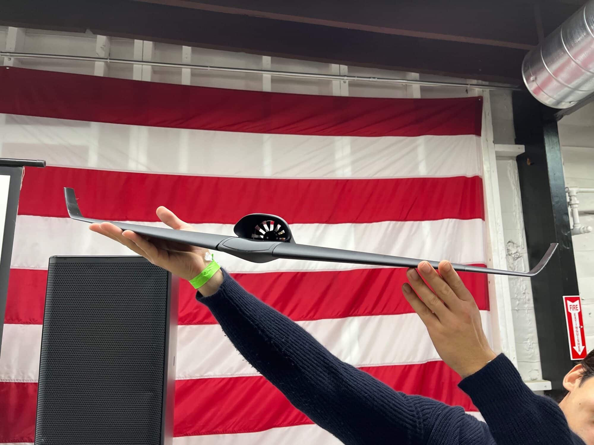 The custom-designed and 3D-printed fixed-wing drone features a large single motor and a downward-facing camera for geo-referencing, allowing it to match its surroundings with pre-downloaded segments of Google Maps to estimate its coordinates.