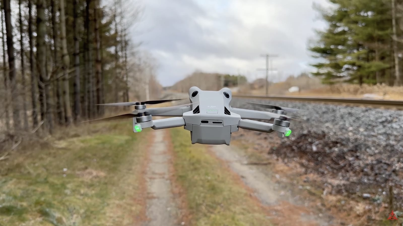 The Mini 4 Pro in flight, quiet enough that bystanders rarely notice it.
