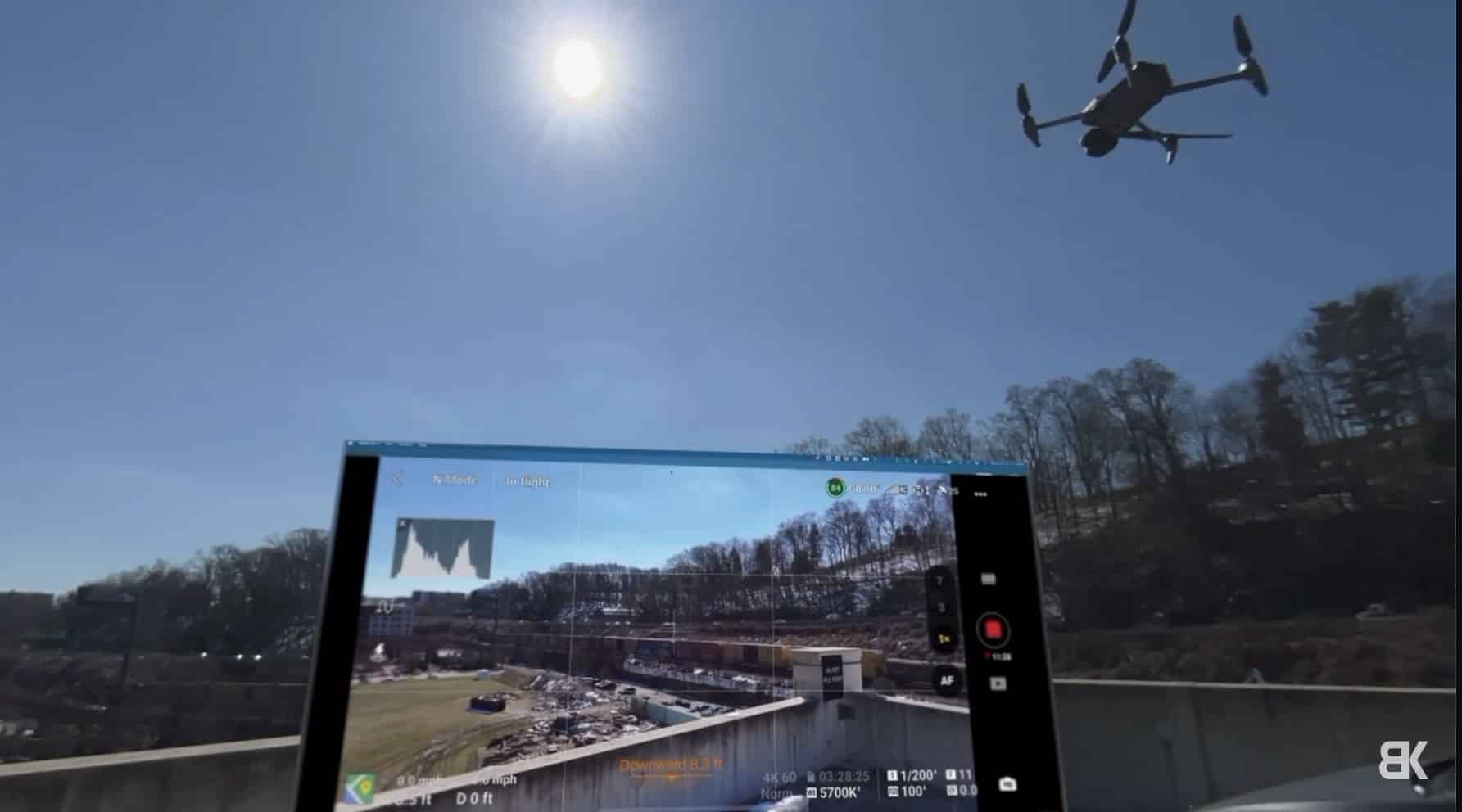 Billy Kyle wearing the Apple Vision Pro headset while flying in augmented reality mode.