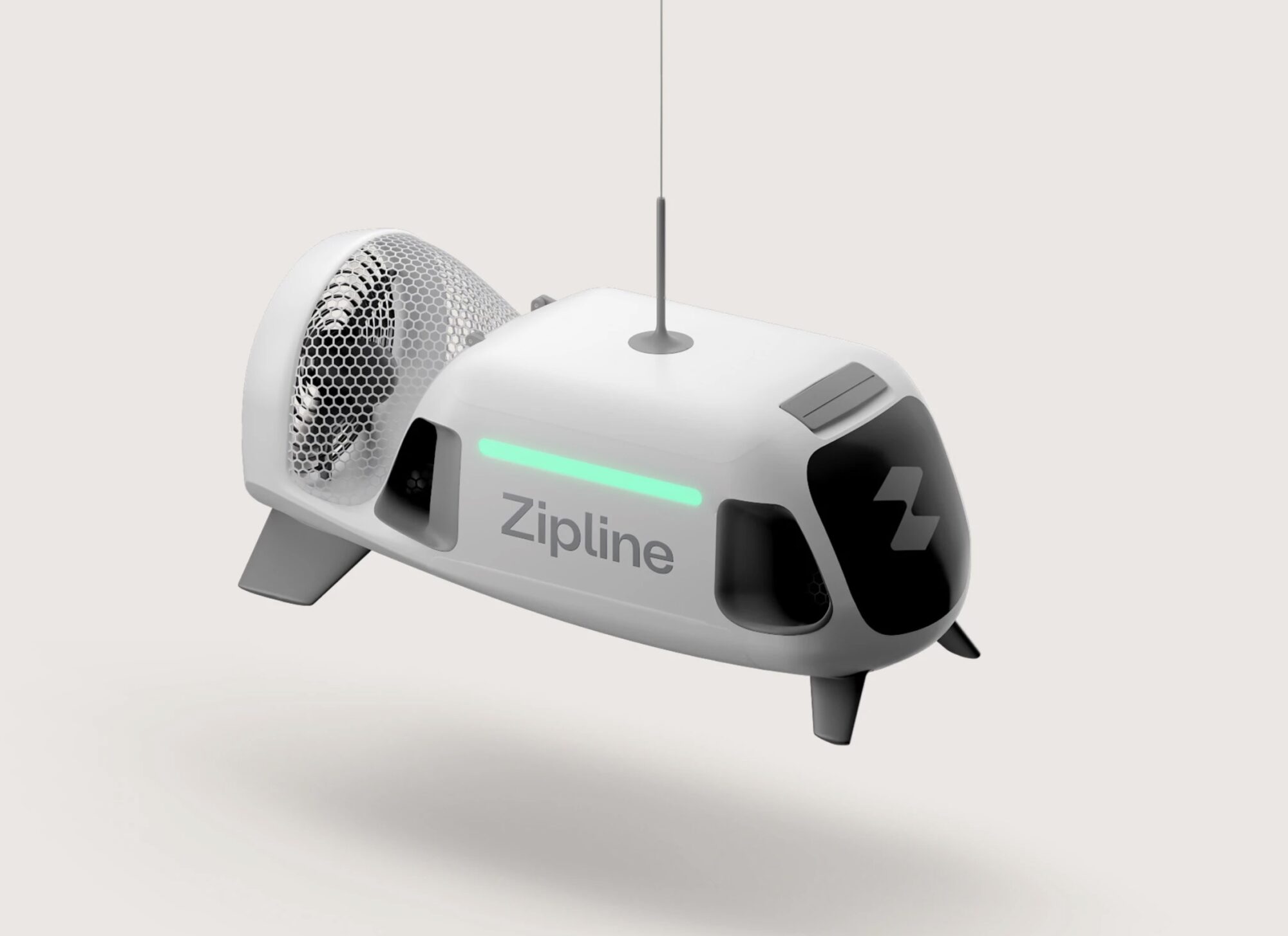 Zipline delivery droid render descending on its tether against a pale background.