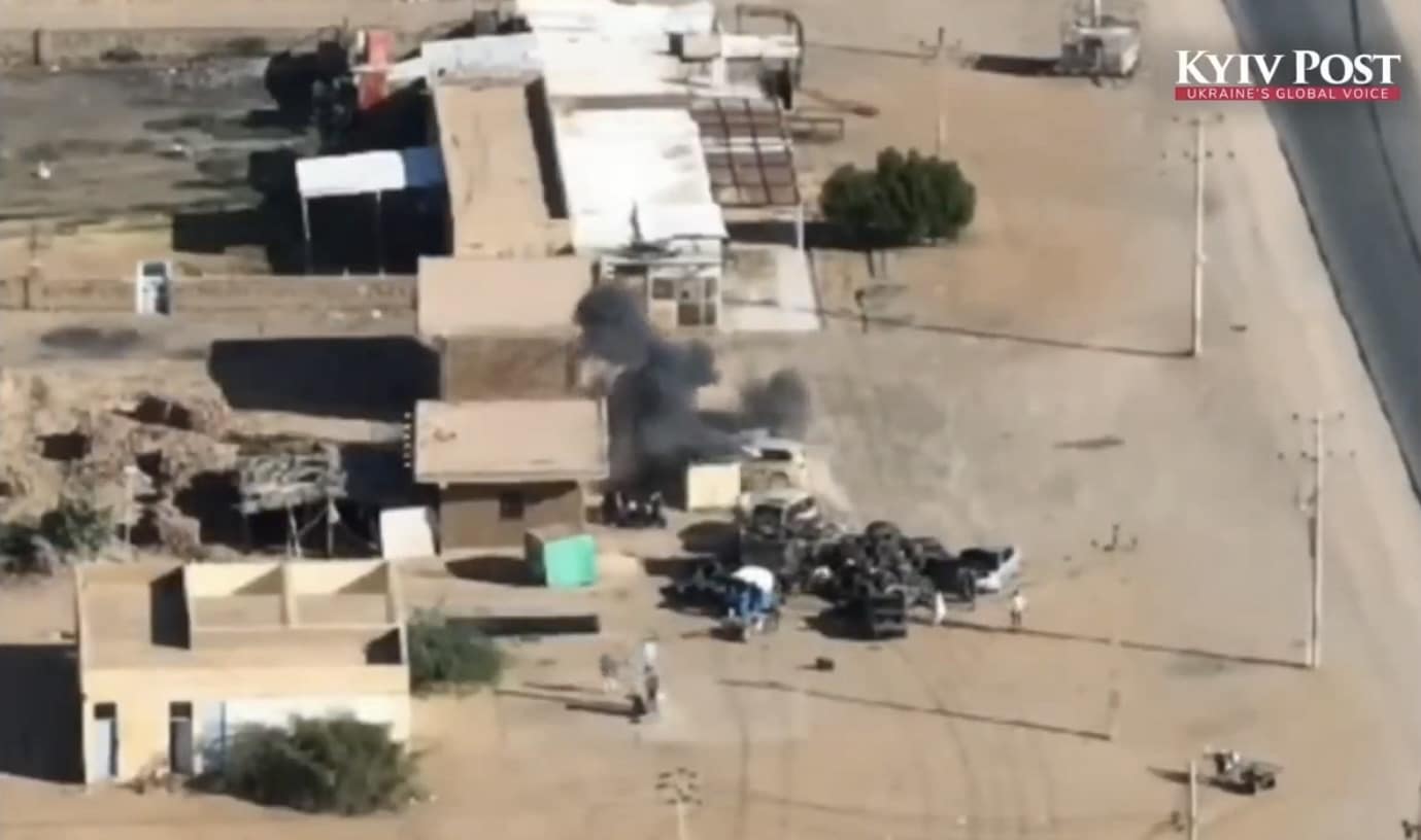 Still from Kyiv Post footage of a Ukrainian drone strike on a vehicle in Sudan.