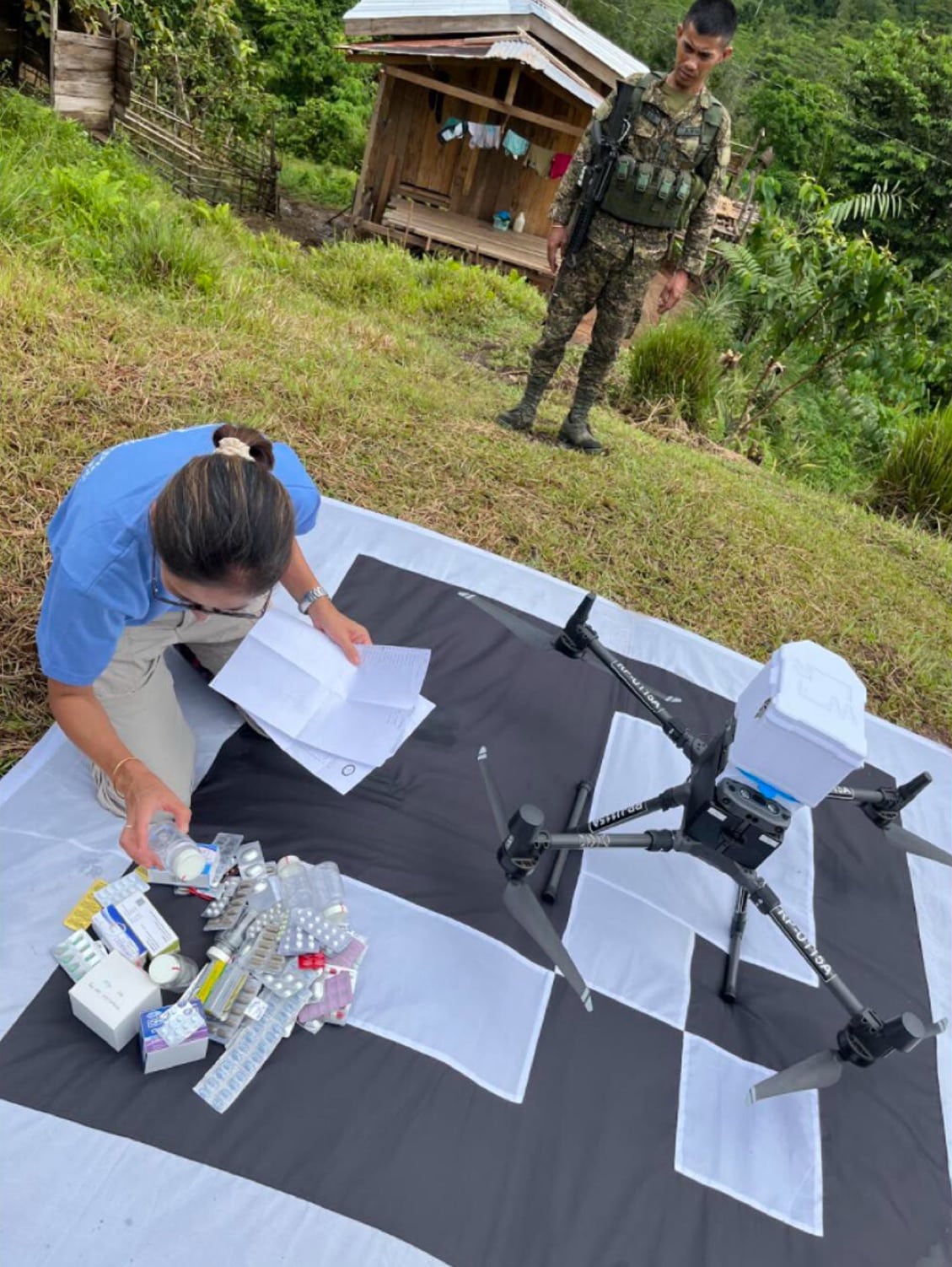 Philippines Flying Labs crew preparing a drone to deliver vaccines to a remote community.