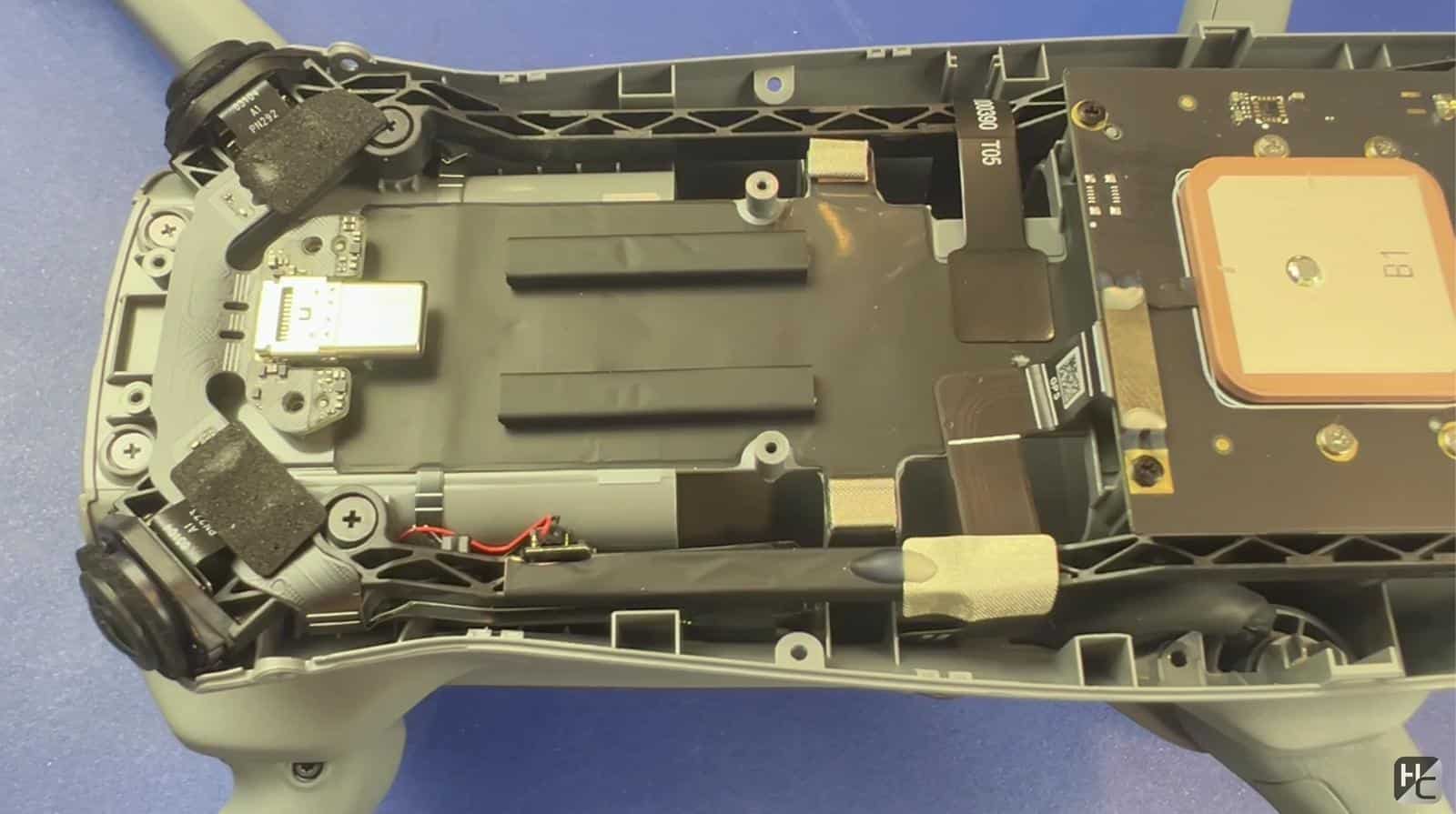 Prop arm hardware inside the Specta Air that Jack calls nearly identical to DJI's.