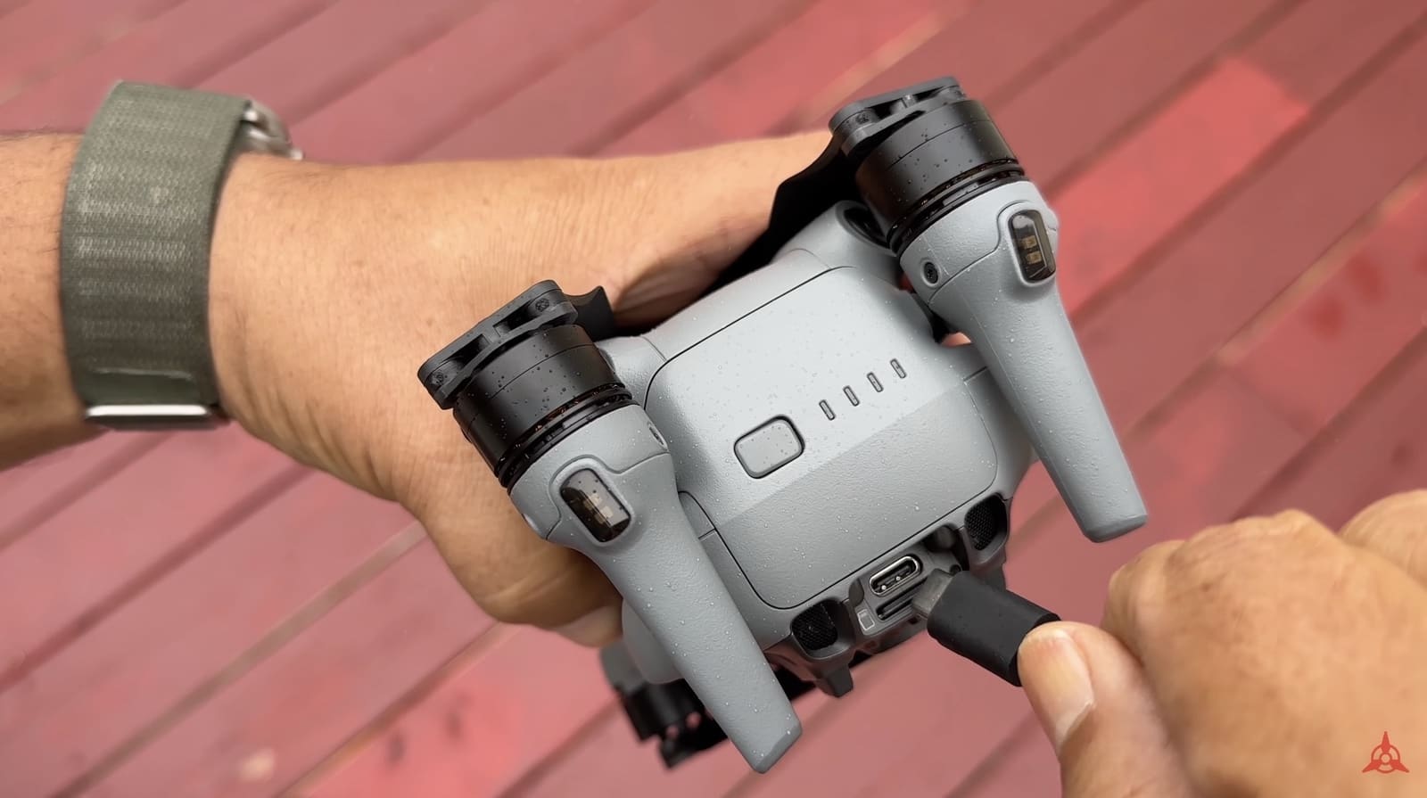 DJI Air 3 charging hub that consolidates several batteries into one.