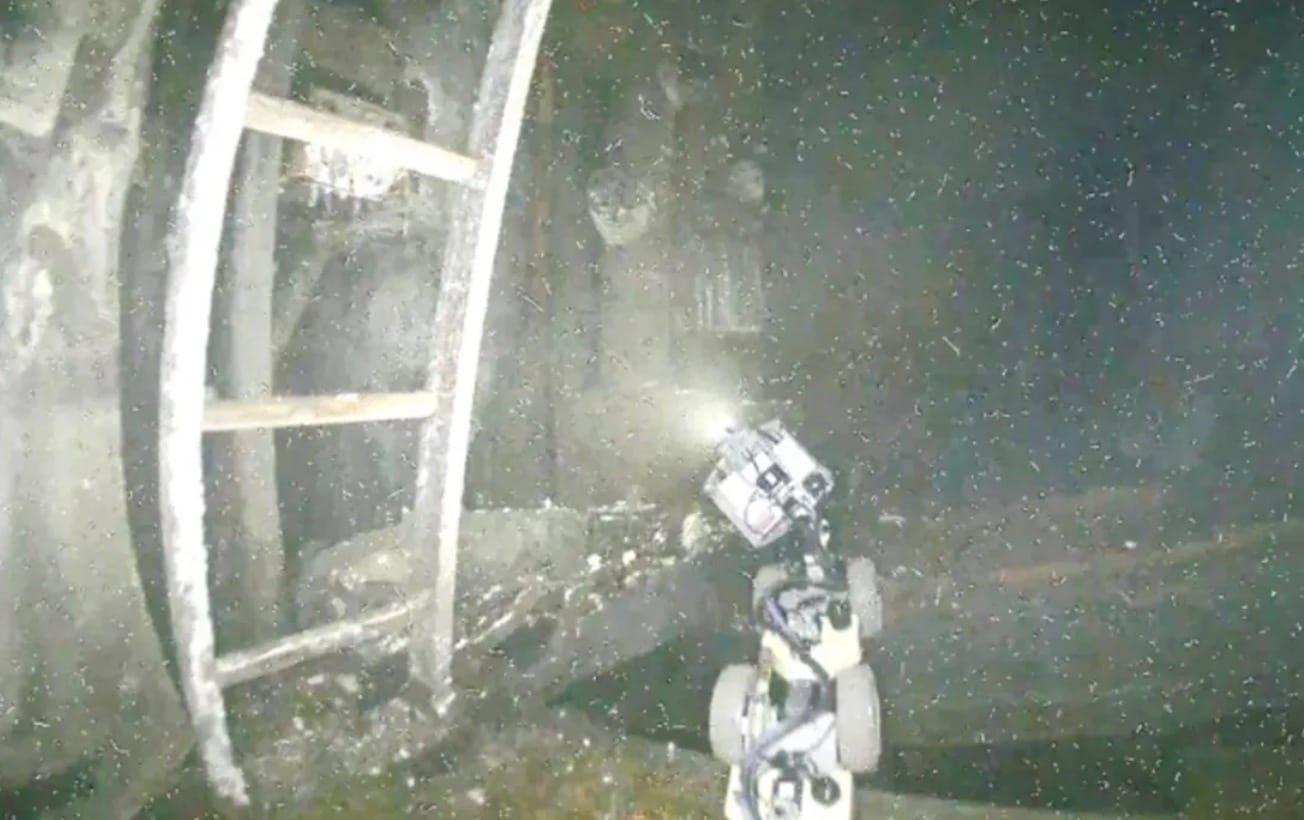 A small drone is used to inspect the inside of the Fukushima Dai-ichi nuclear plant. Photo courtesy of AP.