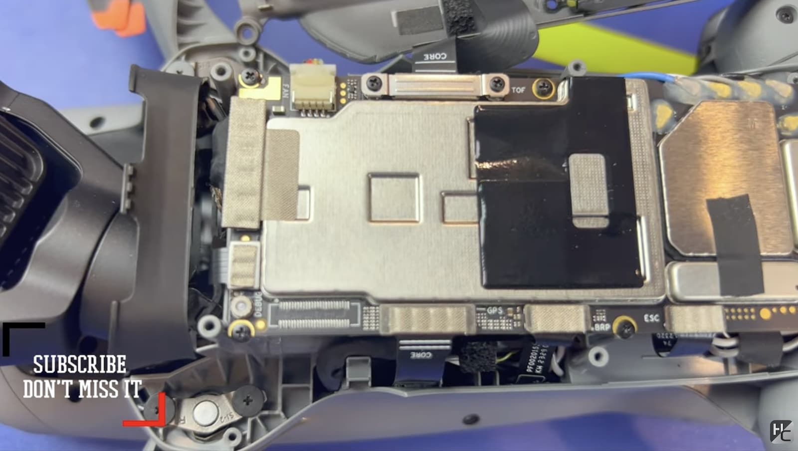 Opened drone shell revealing the internal components Chris compared between models.