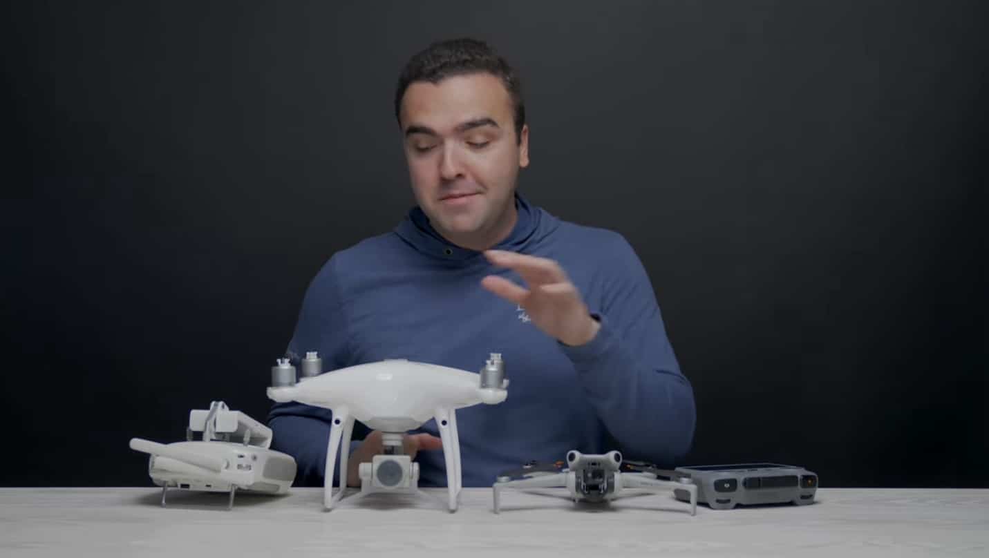 DJI Mini 4 Pro next to the much larger DJI Phantom 4 Pro.