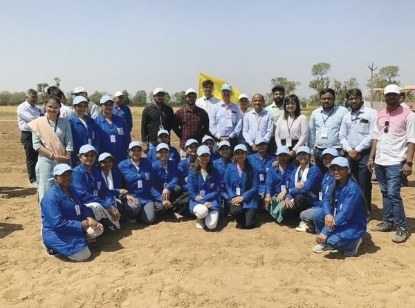 Namo Drone Didi participants in India with an agricultural drone supplied by Drogo Drones.