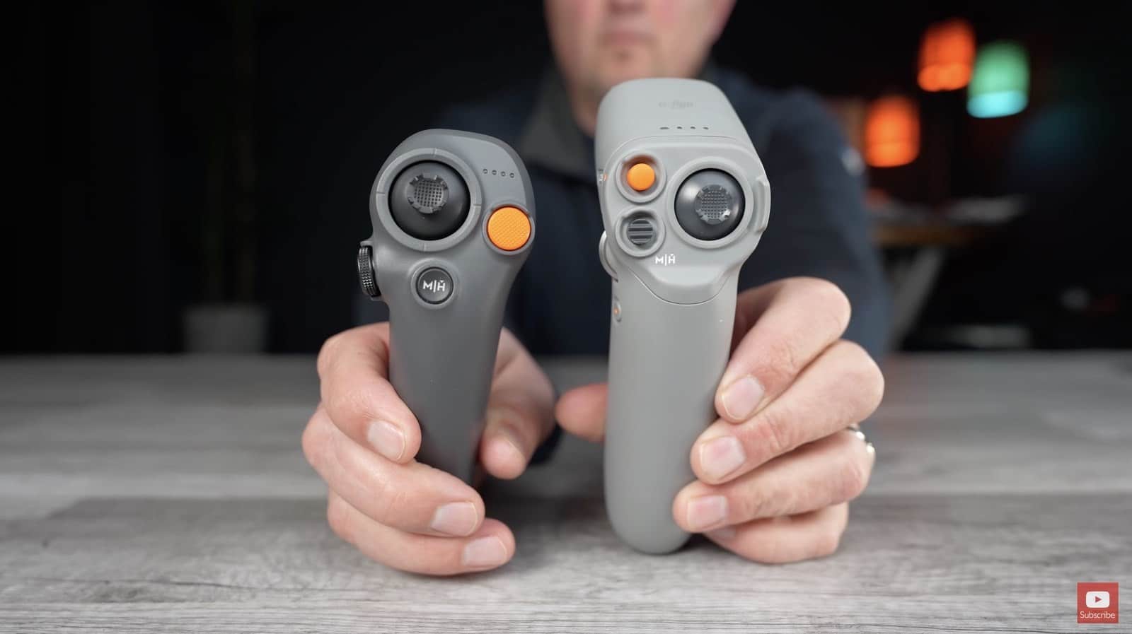 DJI RC Motion 3 controller with its joystick and double-stop trigger.