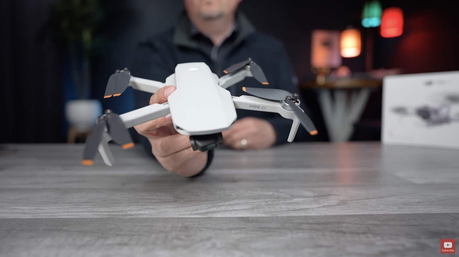 Product view of the folded DJI Mini 4K beginner drone.