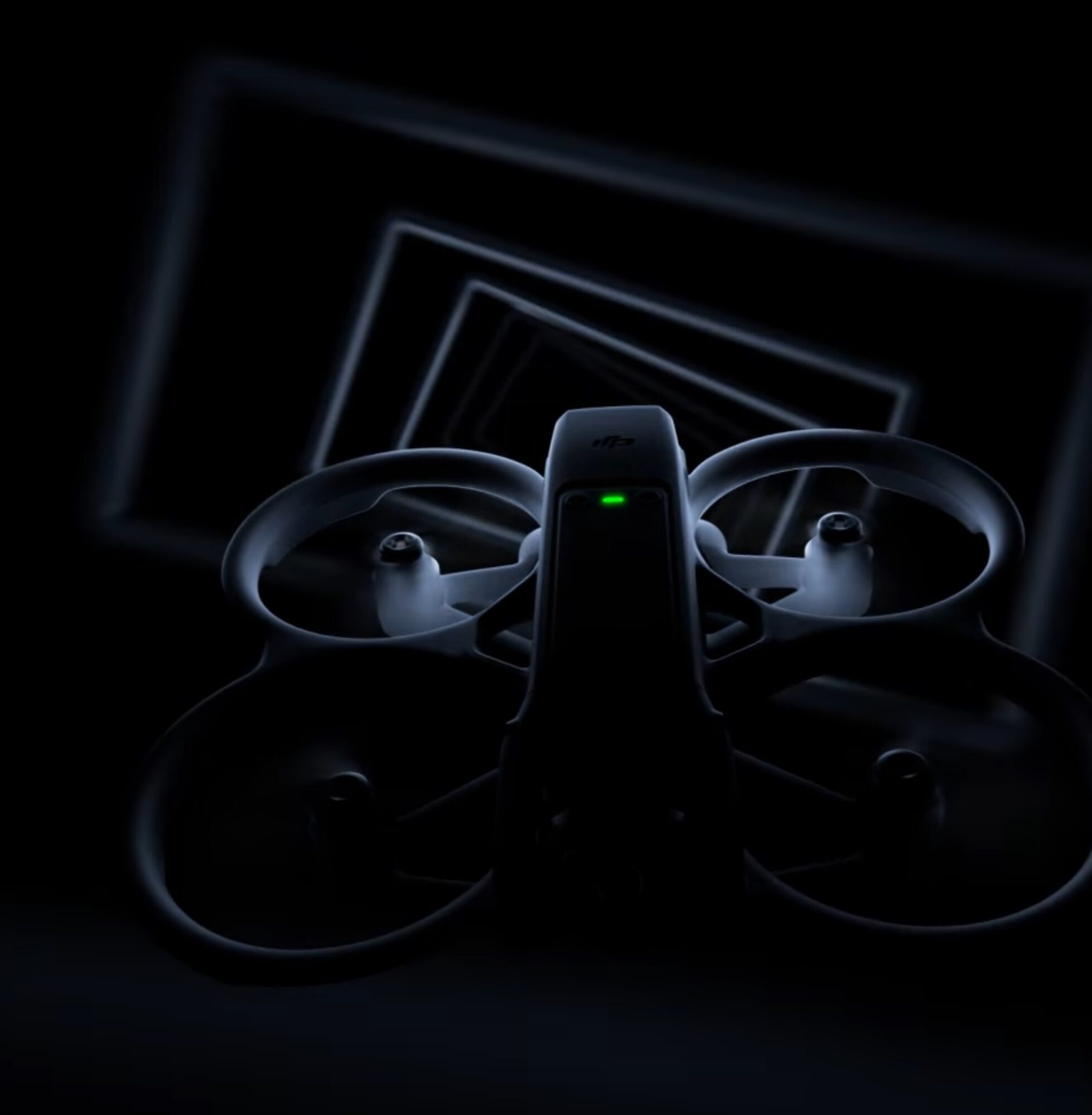 DJI teaser image showing a drone silhouette flying through FPV racing gates.