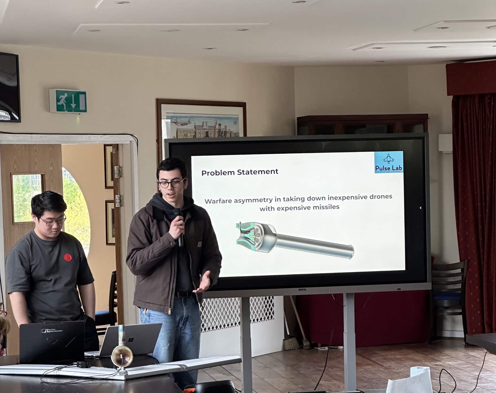 Hackathon team presenting a high-thrust pulse jet engine for low-cost interceptors.