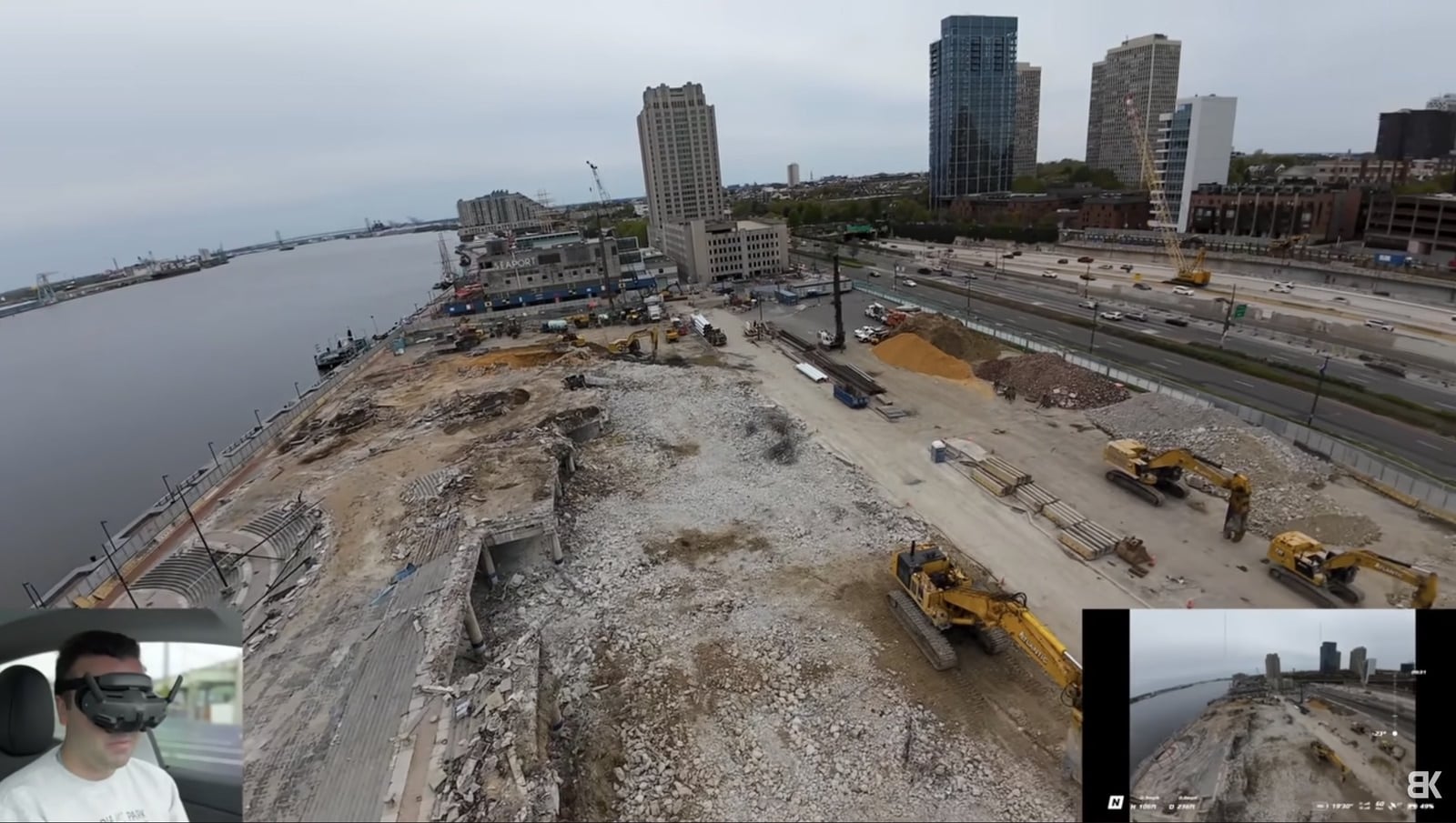 FPV pass over construction machinery staged at the amphitheater site.