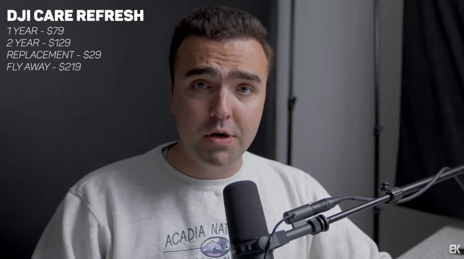 Presenter at a microphone beside a DJI Care Refresh pricing overlay.