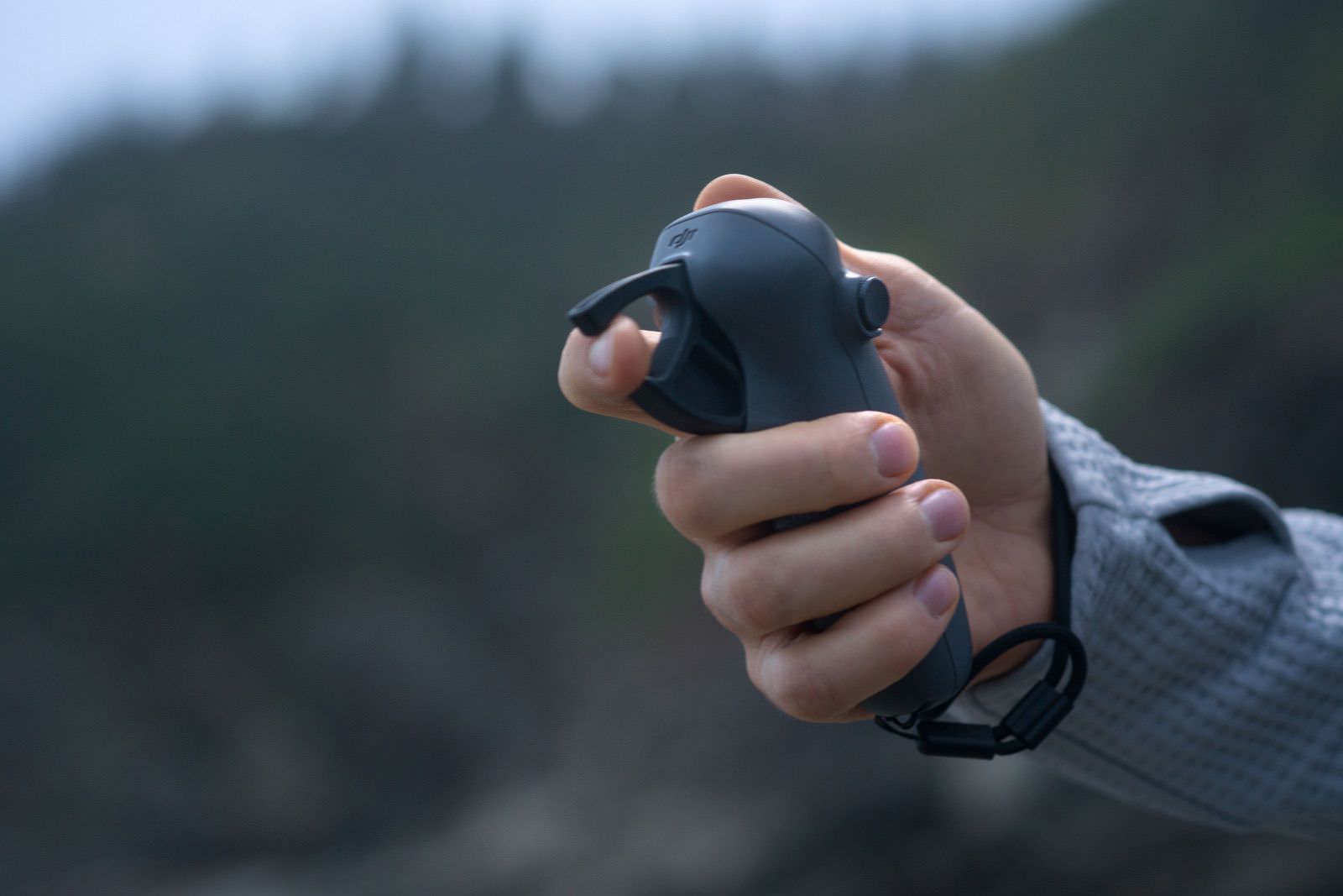 Two-stop throttle trigger on the DJI RC Motion 3 controller.