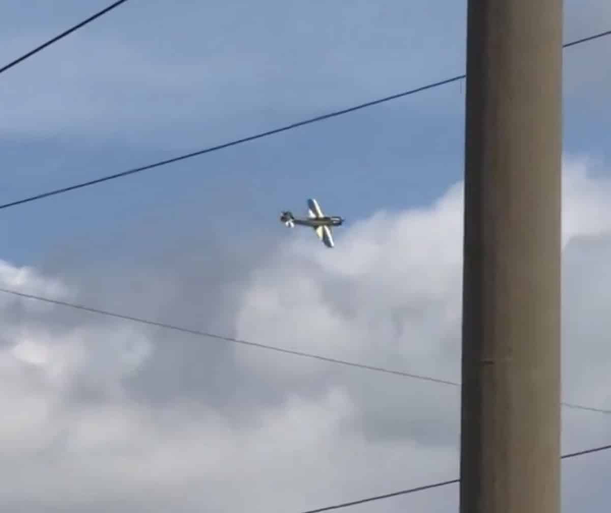 Video still of a Russian reconnaissance drone falling under its parachute over Odesa.