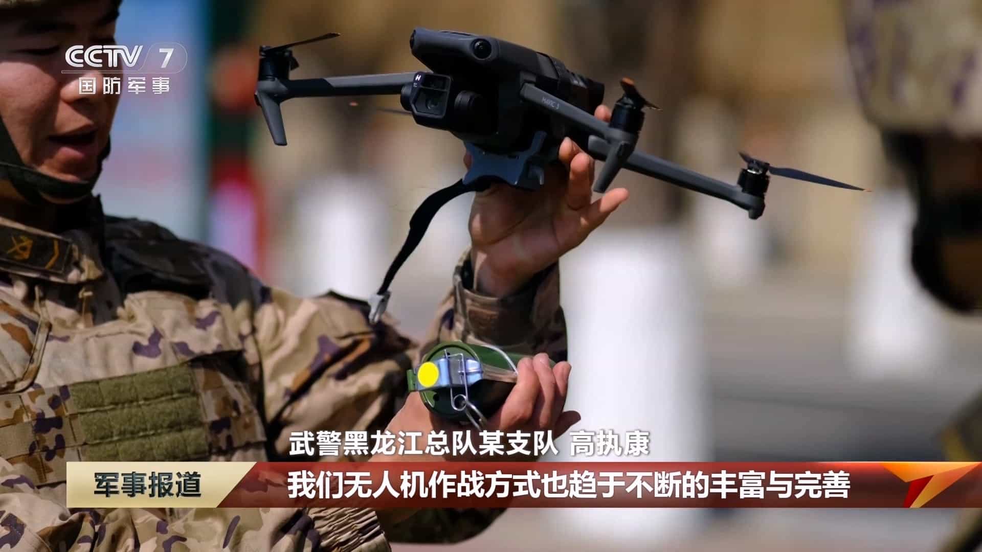 Chinese People's Armed Police troops handling a DJI Mavic 3 during training.