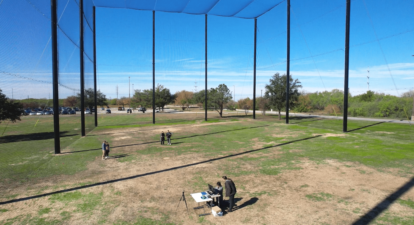 University of North Texas President Neal Smatresk officially opens the new drone testing facility at Discovery Park by cutting the ceremonial green ribbon during Thursday's inauguration event. Image credit: Pete Comparoni, UNT (courtesy photo)