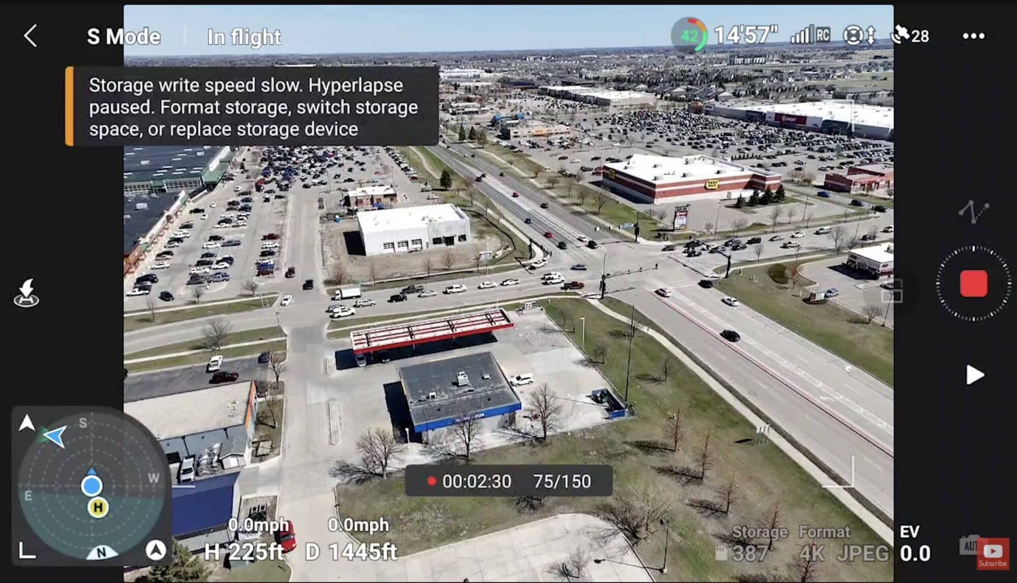Screenshot of the DJI Fly app warning that slow storage paused a hyperlapse.