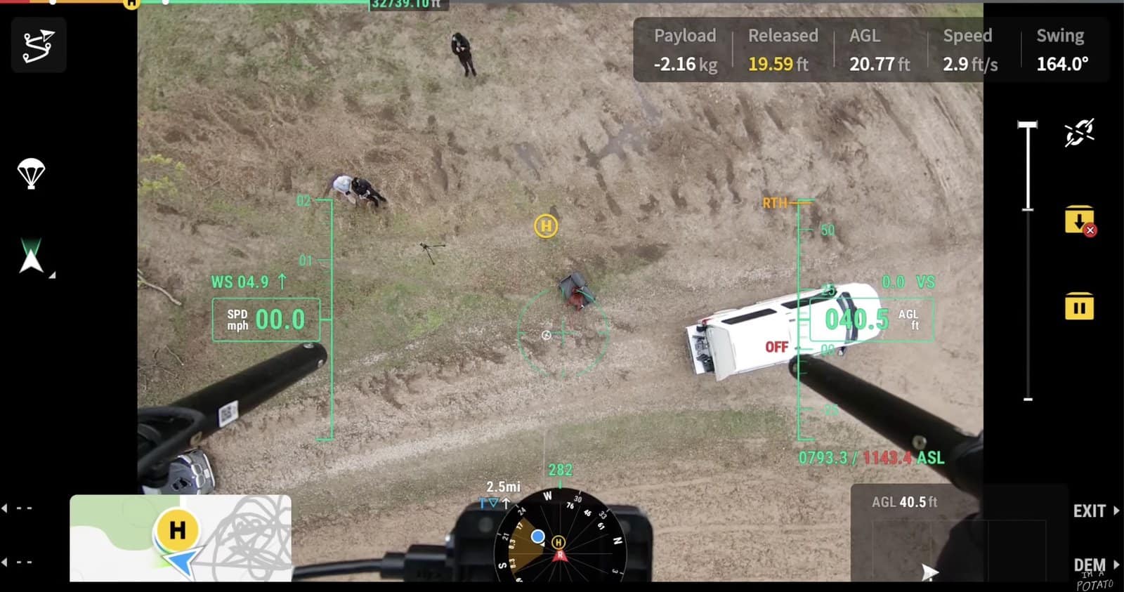 Controller view of a white van and ground crew with swing angle telemetry.