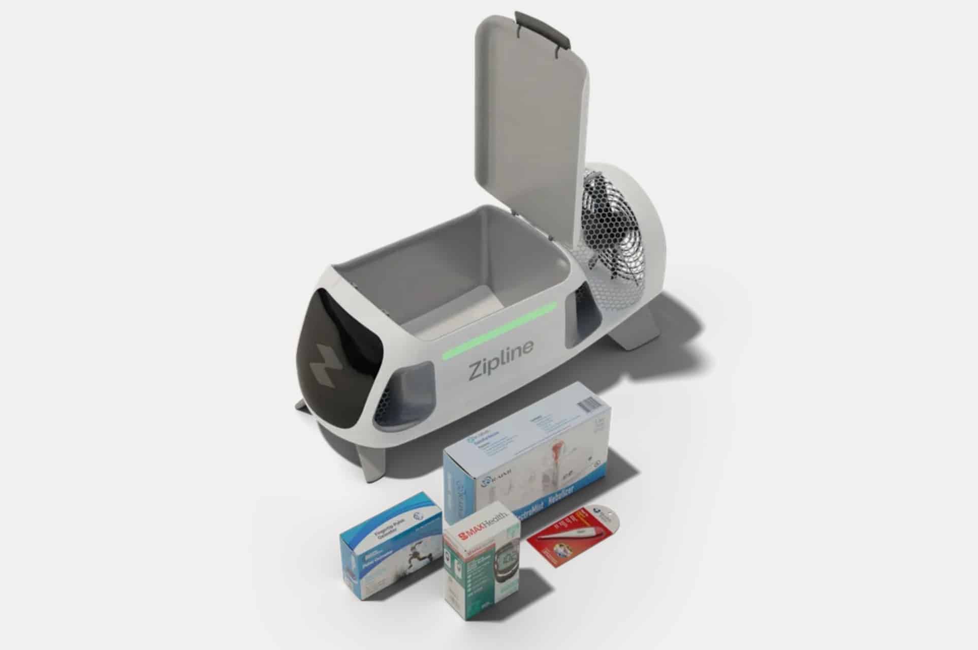 Zipline delivery droid with its cargo bay open beside boxed medical supplies.