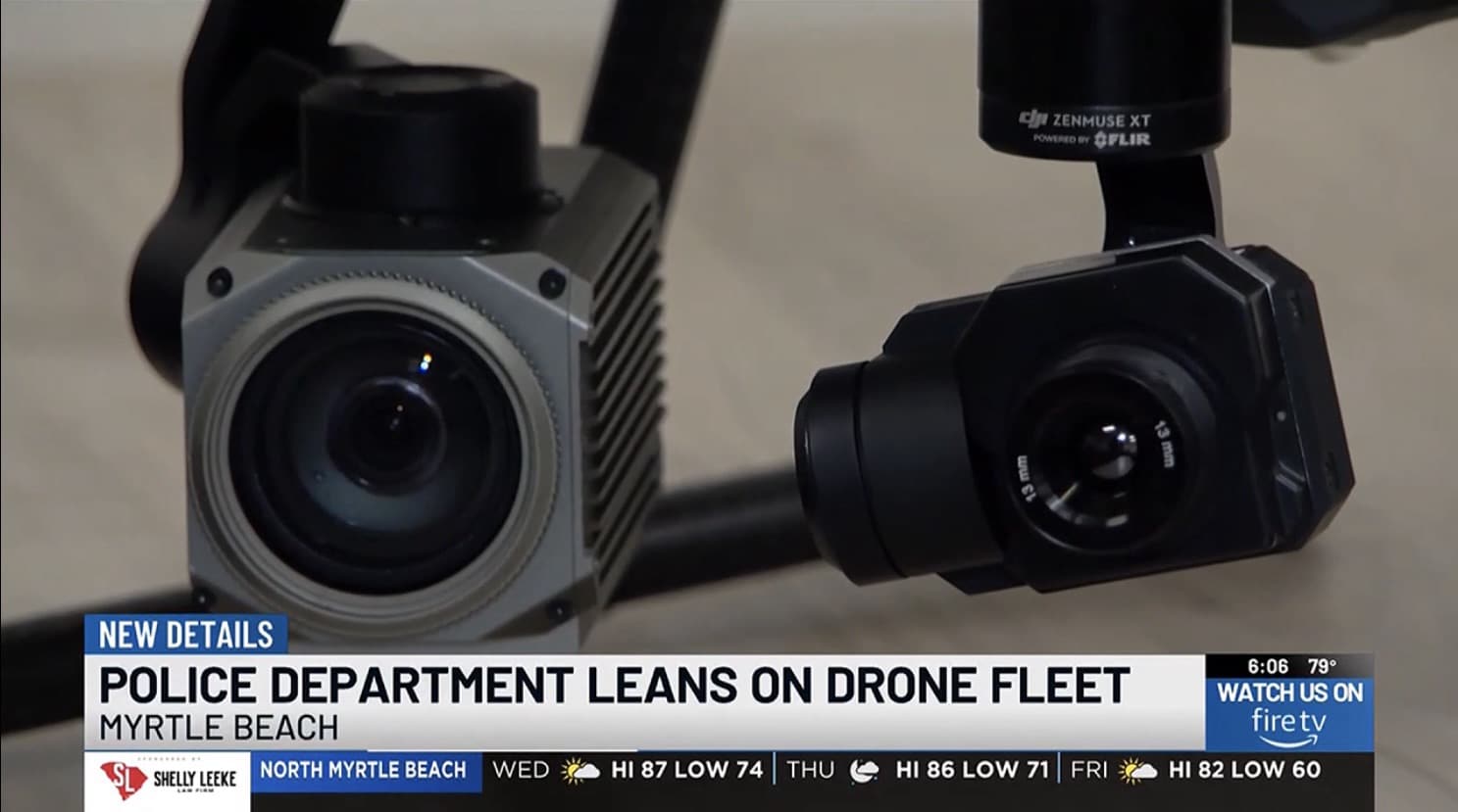 Close-up of a DJI Zenmuse XT thermal camera beside a zoom camera payload.