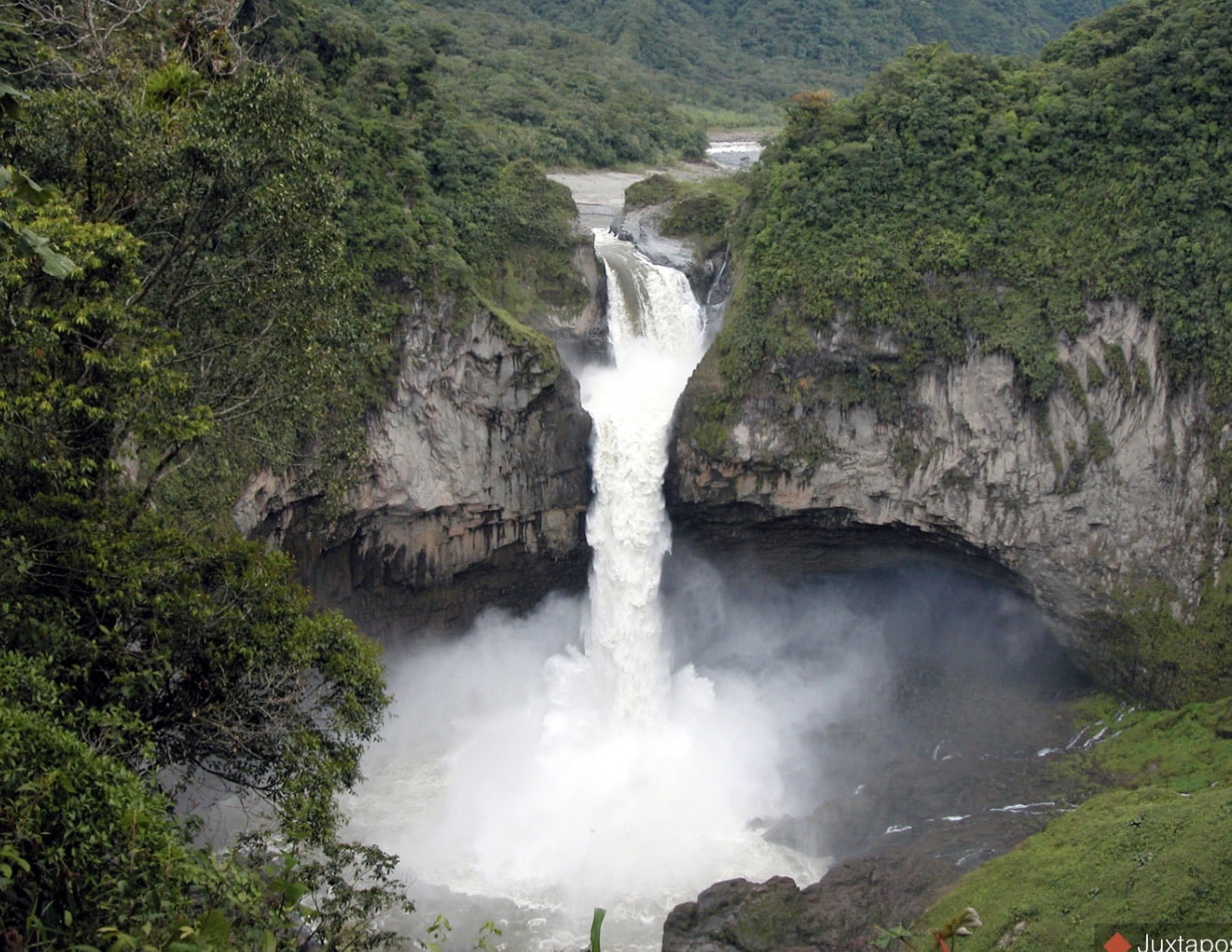 The intact San Rafael Falls thundering into its gorge before the riverbed collapse.