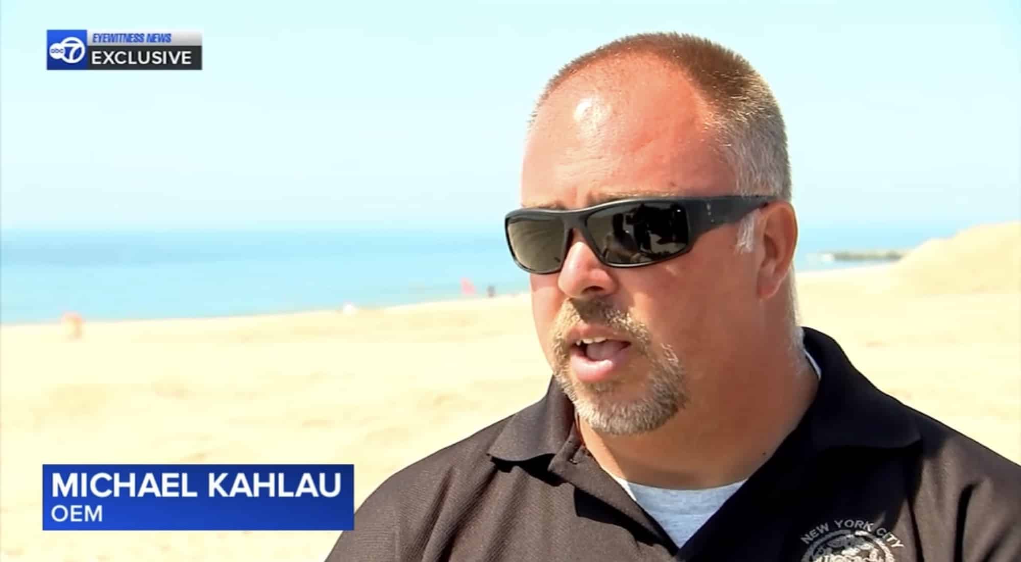 Michael Kahlau of New York City Emergency Management speaking to the camera on the sand.