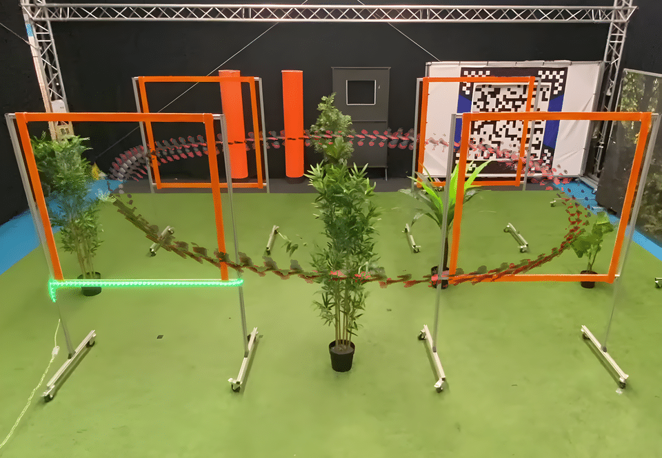 TU Delft Cyber Zoo course with orange gates, plants and a plotted flight path.
