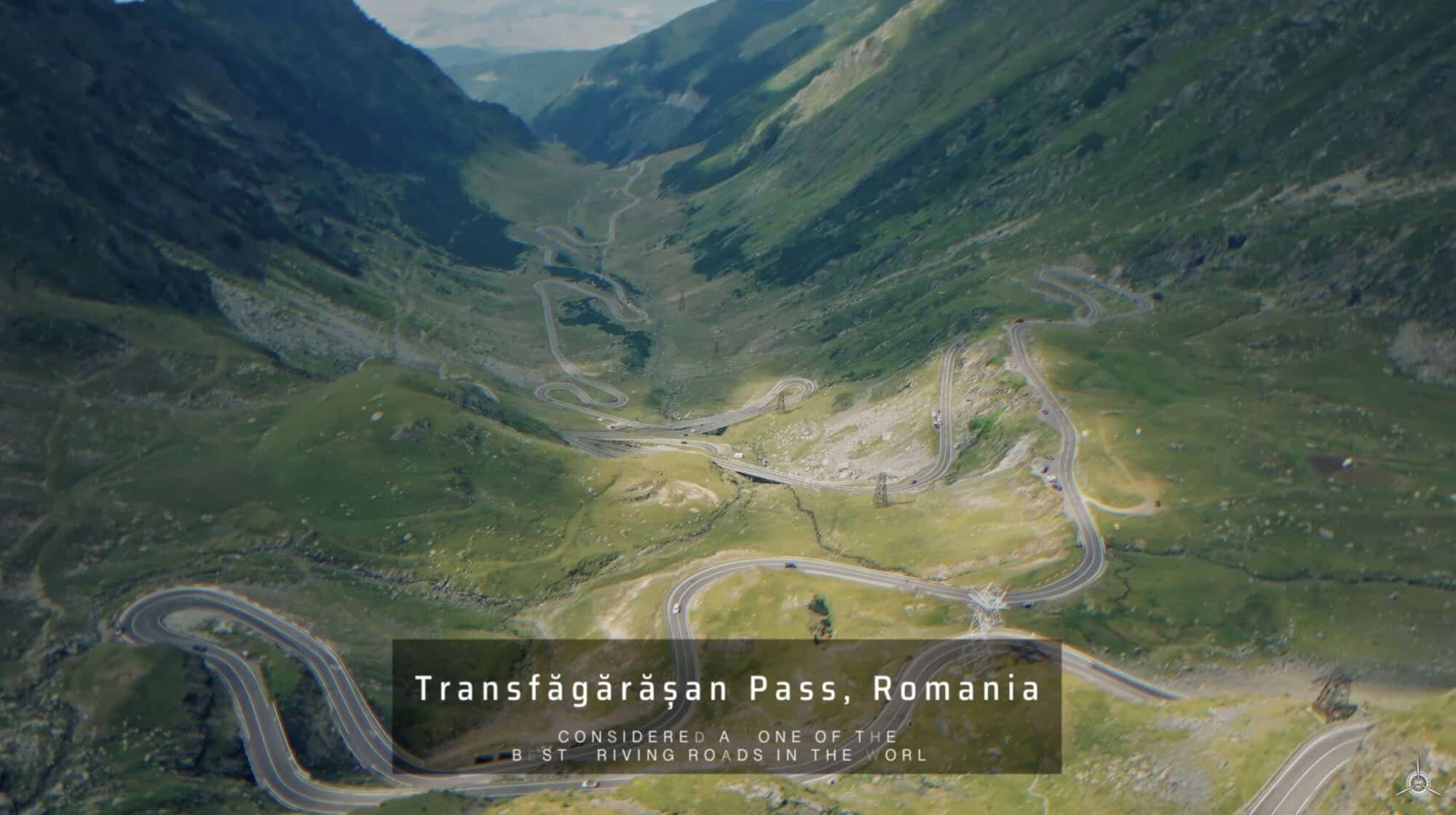 Aerial view of the Transfăgărășan road's hairpin turns cutting through green valleys.