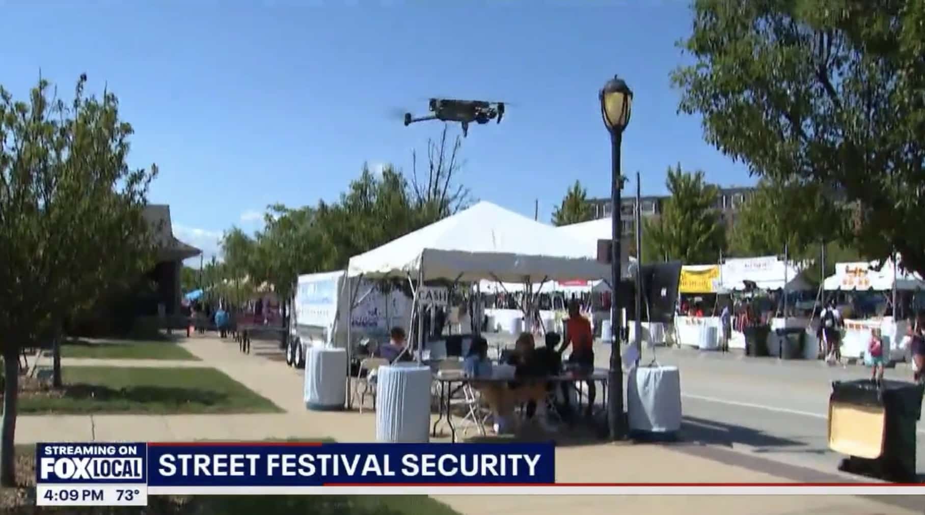 Police drone hovering above the food tents at the Taste of Park Ridge.
