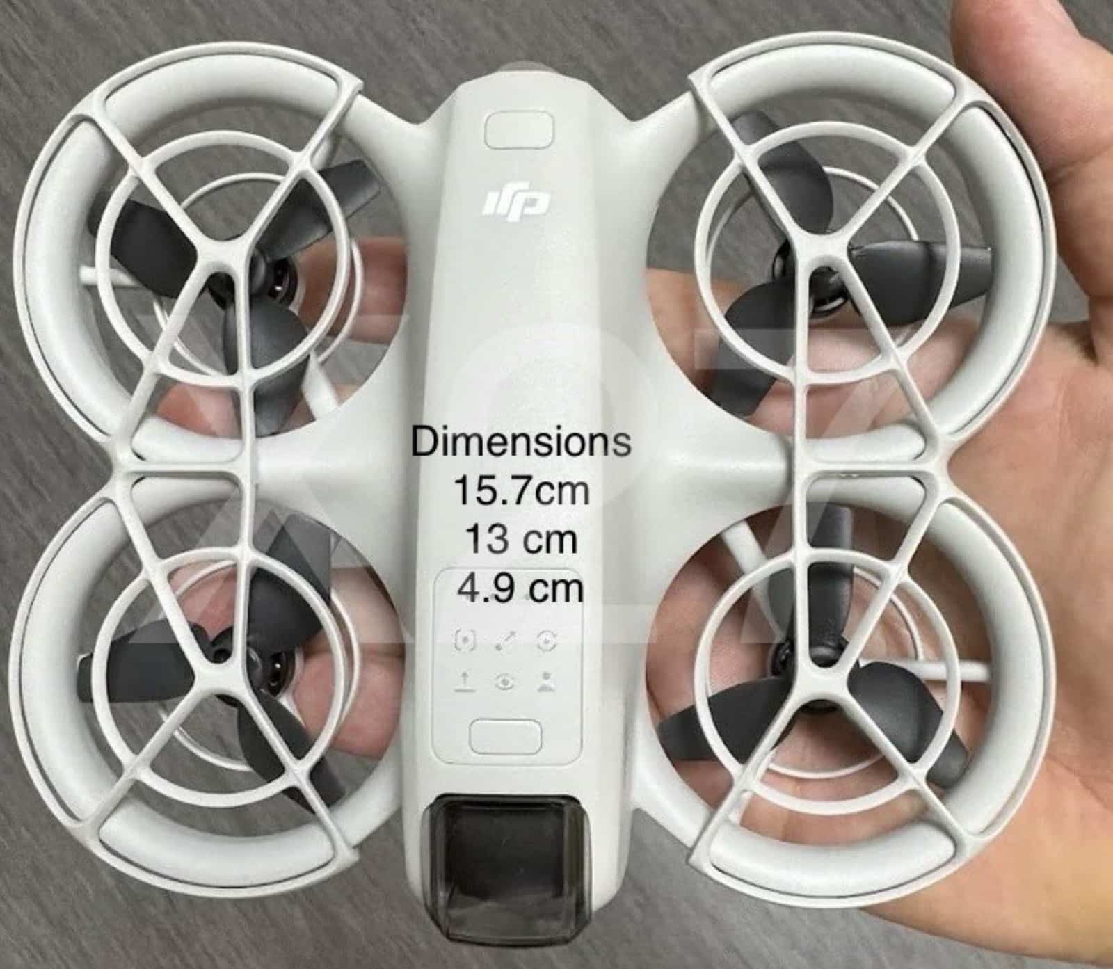 Hands holding the DJI Neo with its 6.2 by 5.1 by 1.9 inch dimensions listed.