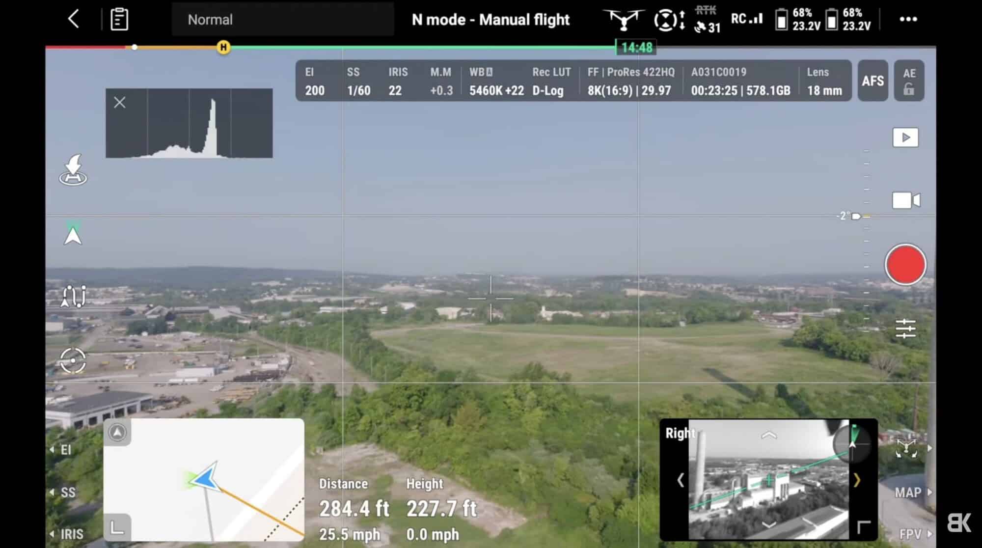DJI Inspire 3 flight interface with camera settings over an aerial valley view.
