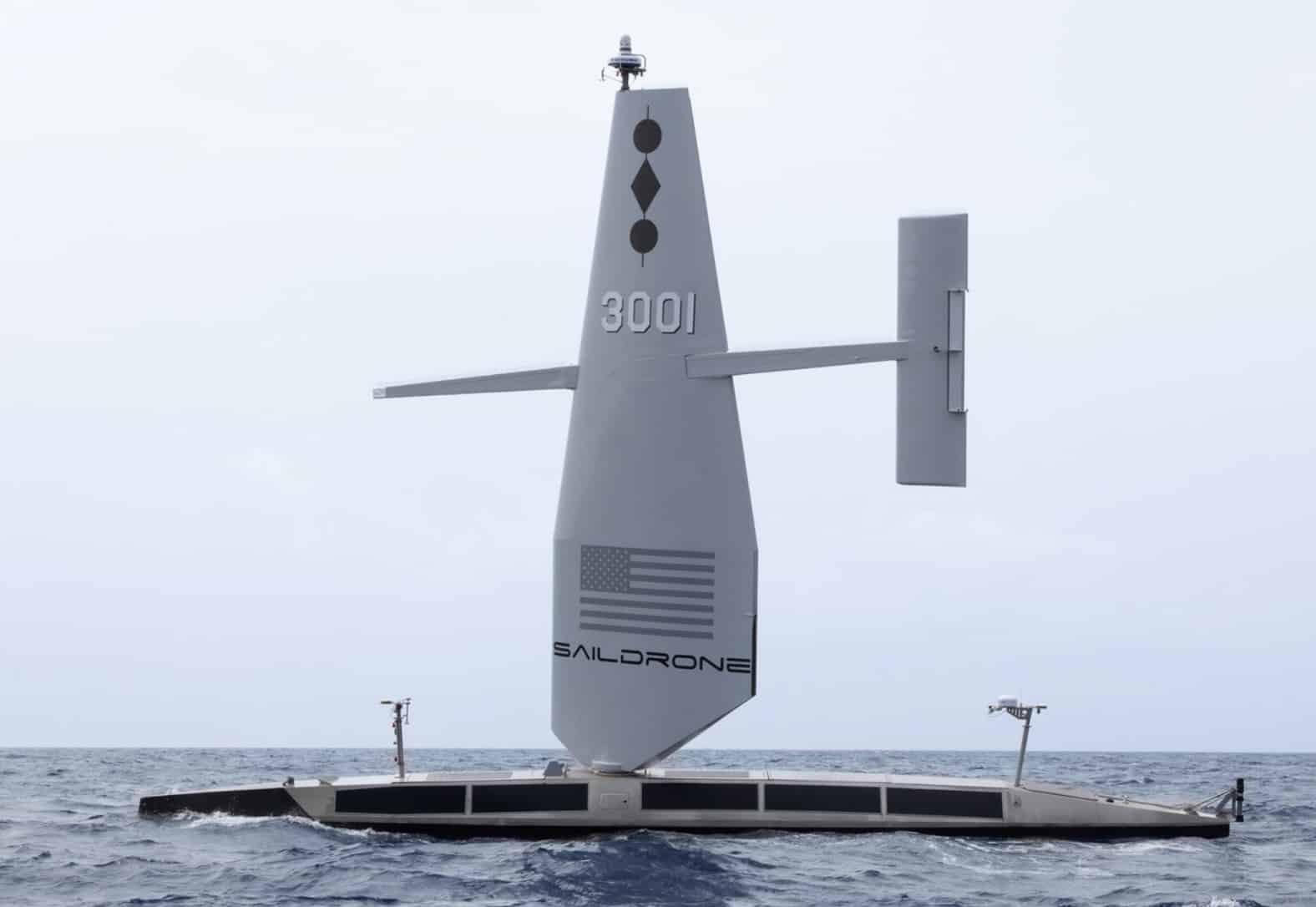 Closer view of Saildrone Surveyor 3001 showing solar panels and sensor masts.
