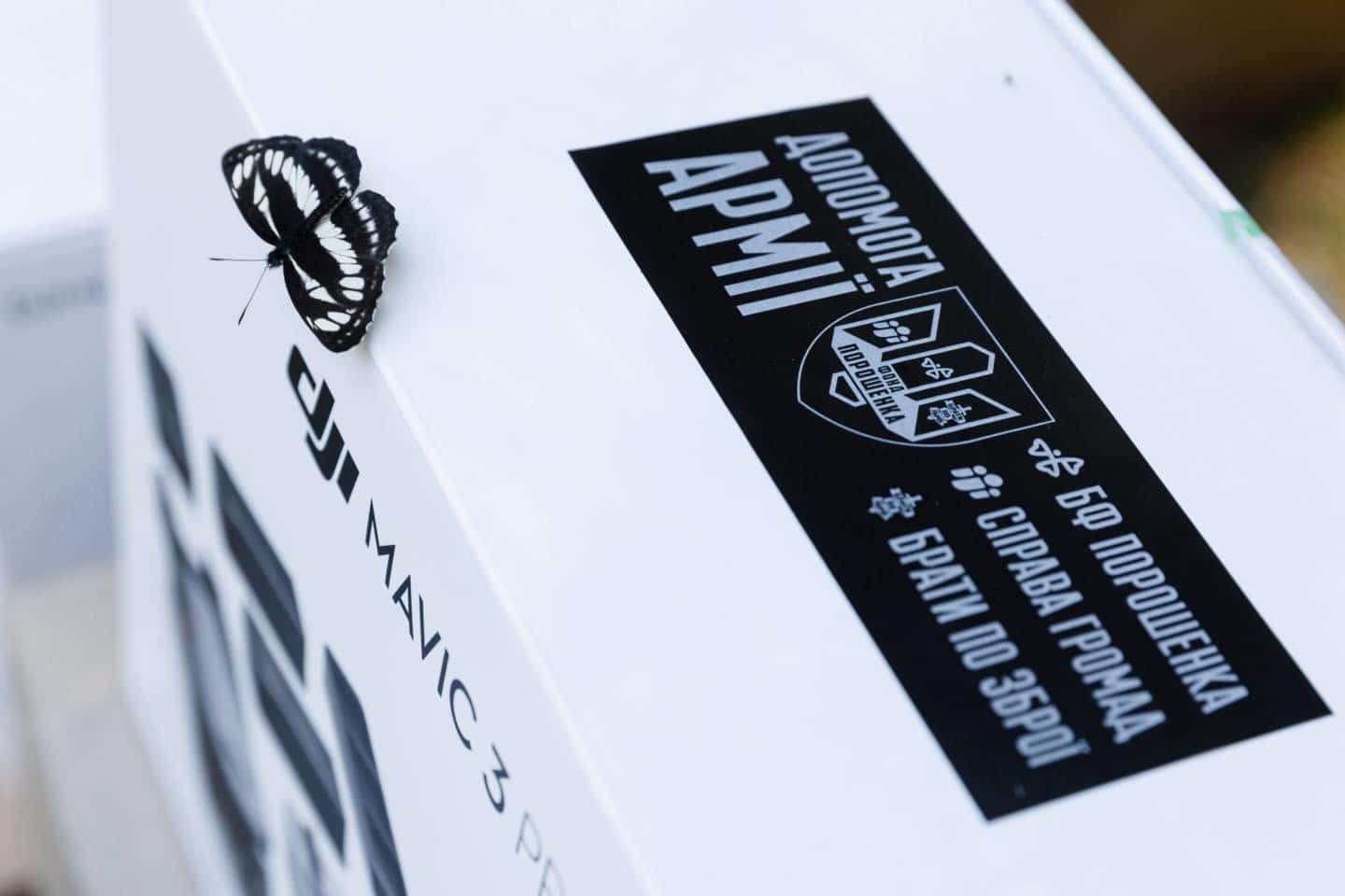 Close-up of a Mavic 3 Pro box carrying a Ukrainian army aid sticker.