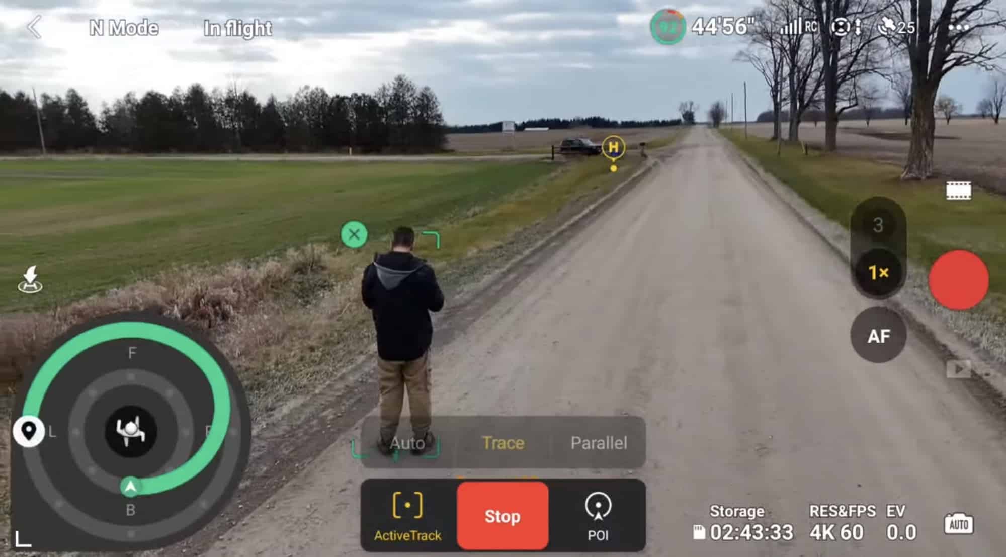 ActiveTrack following a person on a gravel road with Trace mode selected.