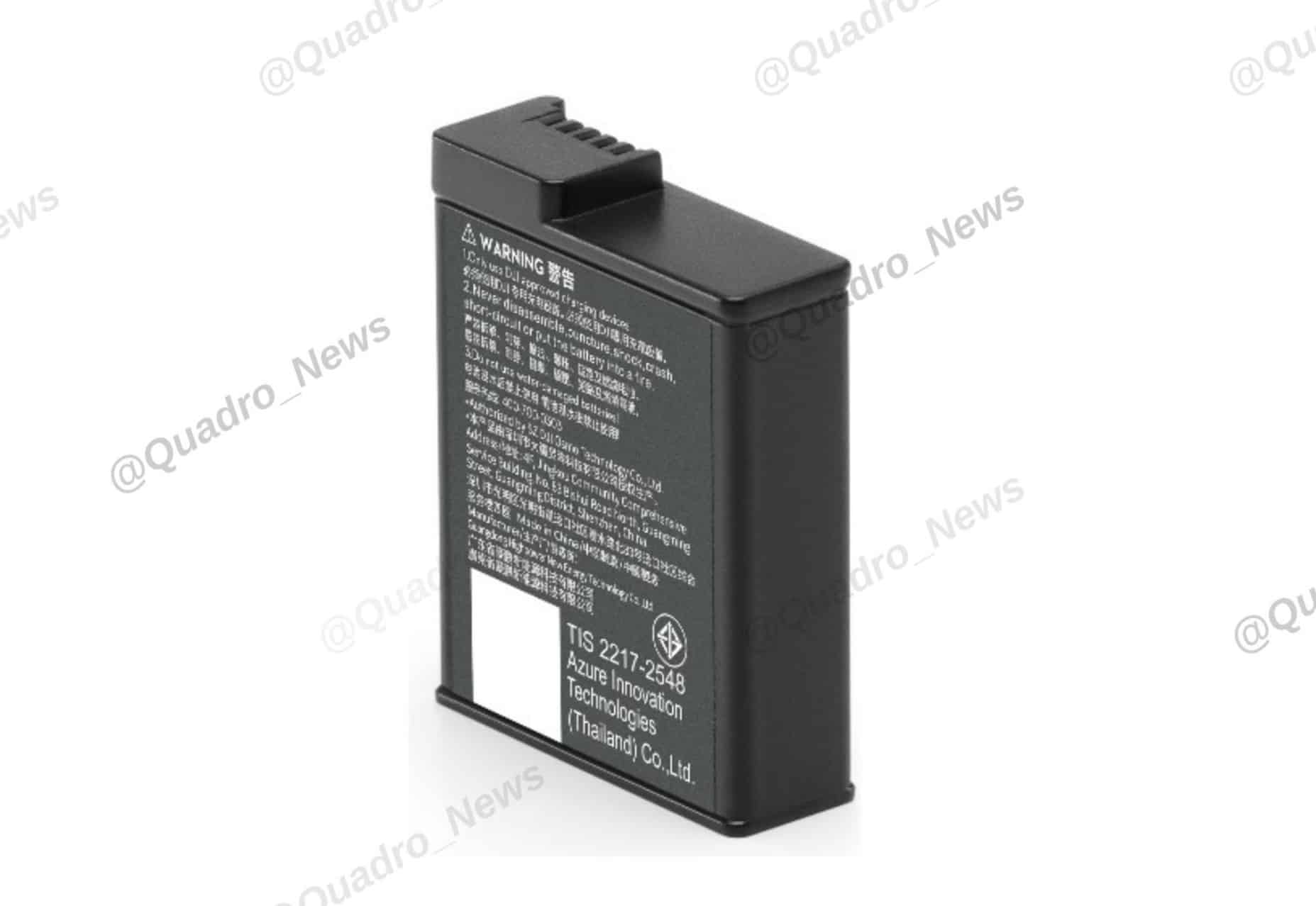 Second leaked frame showing the camera alongside its multi-battery case.