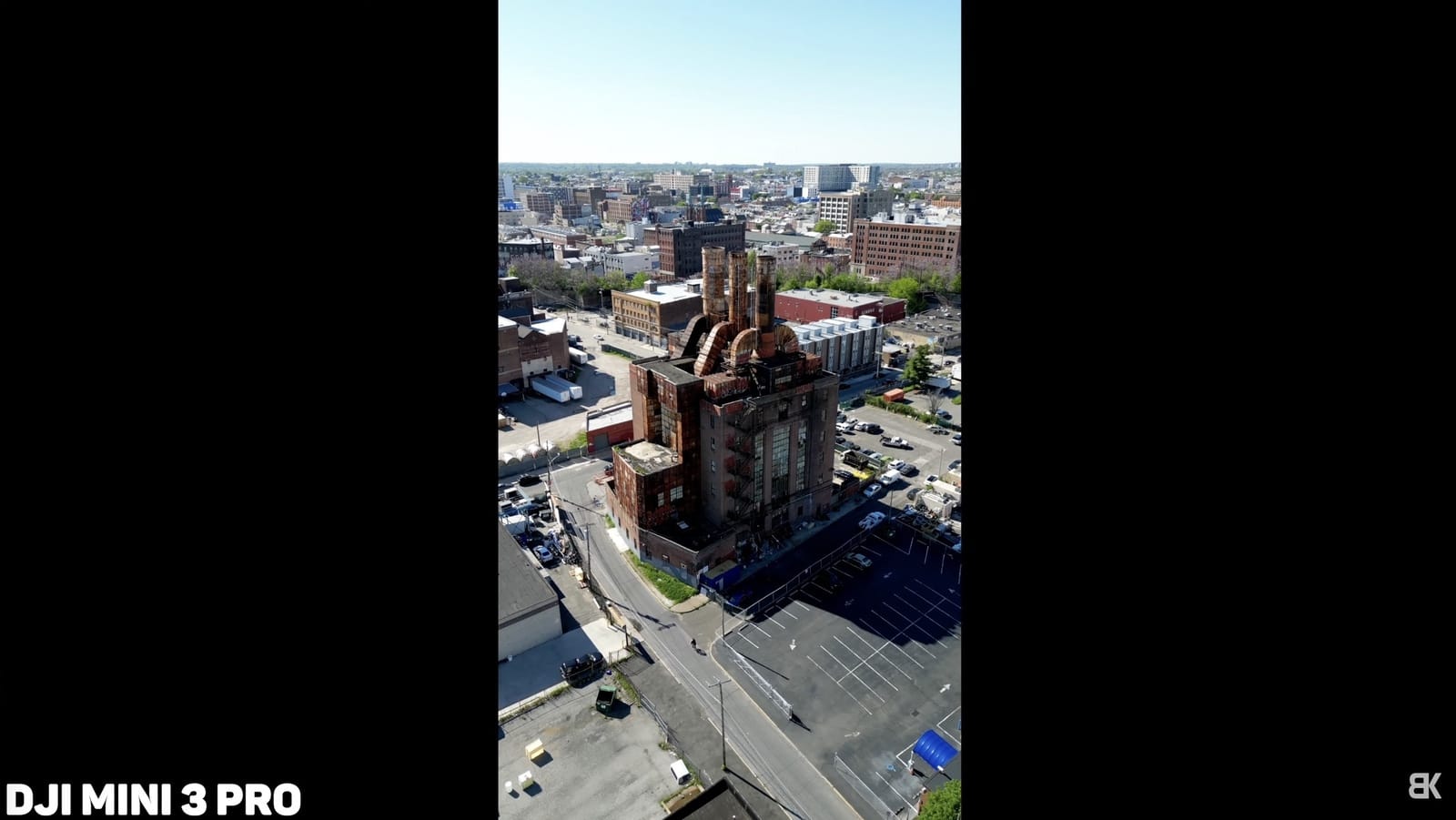 Vertical clip from a Mini 3 Pro framed by black bars on both sides.