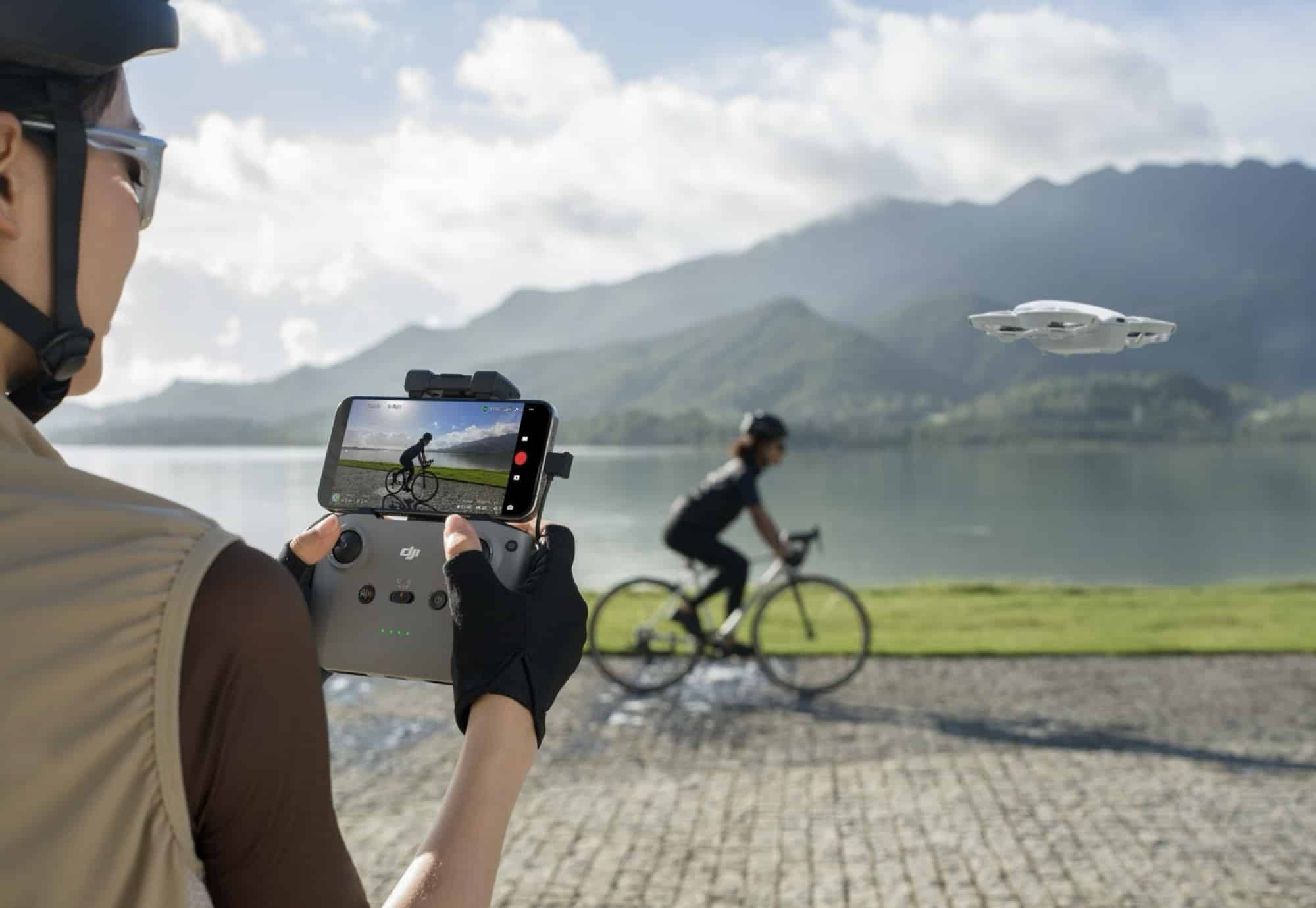 Live video of a cyclist on the controller screen while the Neo tracks ahead.