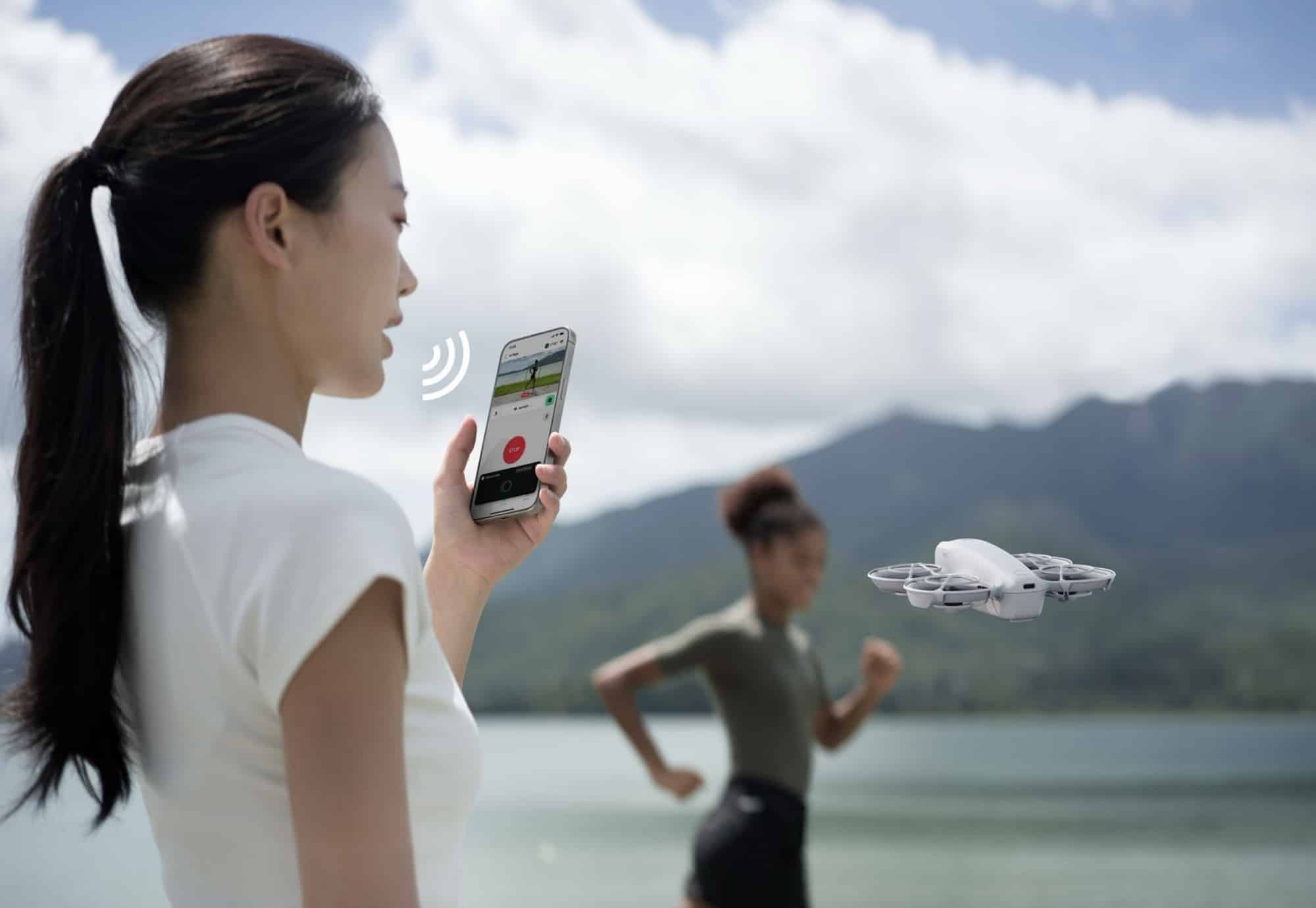 A woman issues a voice command to her phone while the Neo follows a runner.