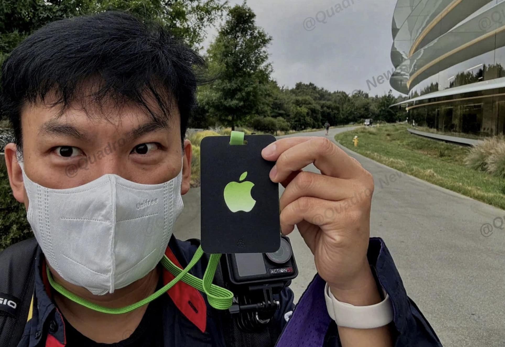 Attendee wearing an Action 5 Pro on his shoulder at Apple's It's Glowtime event.