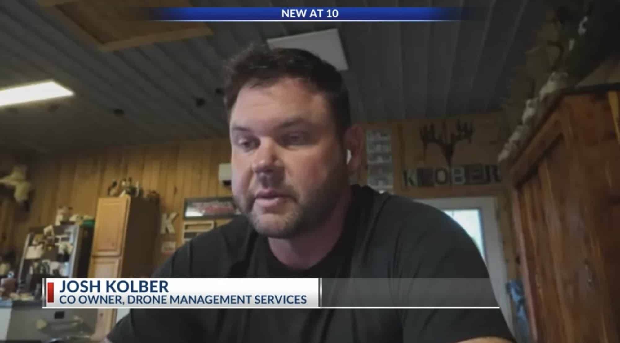 News interview with Josh Kolber, co-owner of Drone Management Services, in a workshop.